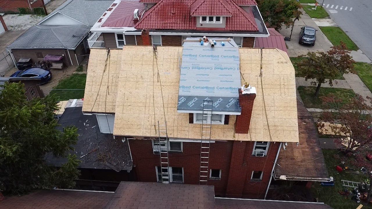 Adkins Project  by Fahey Roofing + Contracting