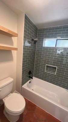 Braun Station Bathroom Remodel Mixing Sage Subway Tile & Saltillo Flooring