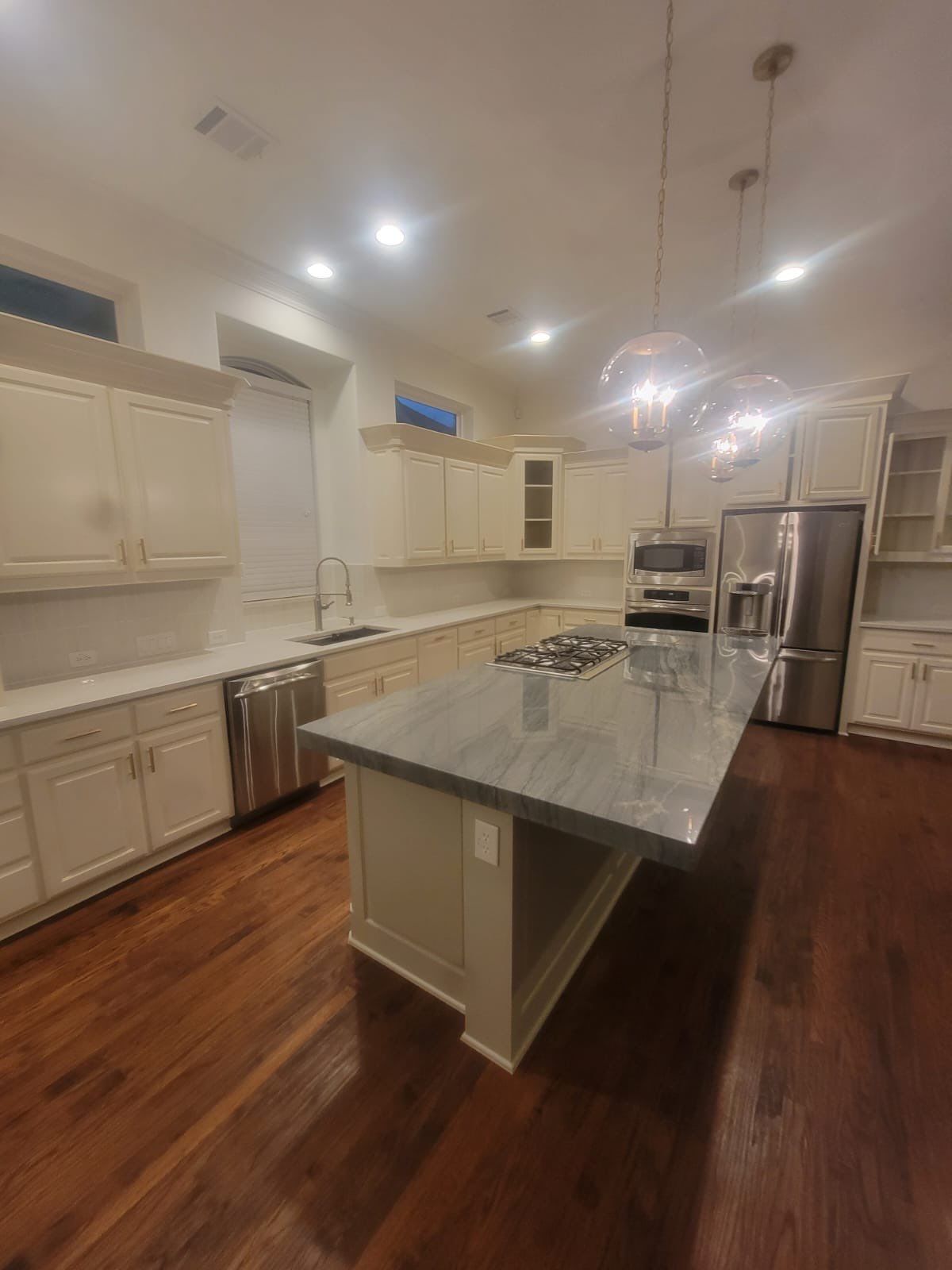Kitchen Remodel using Quartzite by SLM General Contractors & Roofing