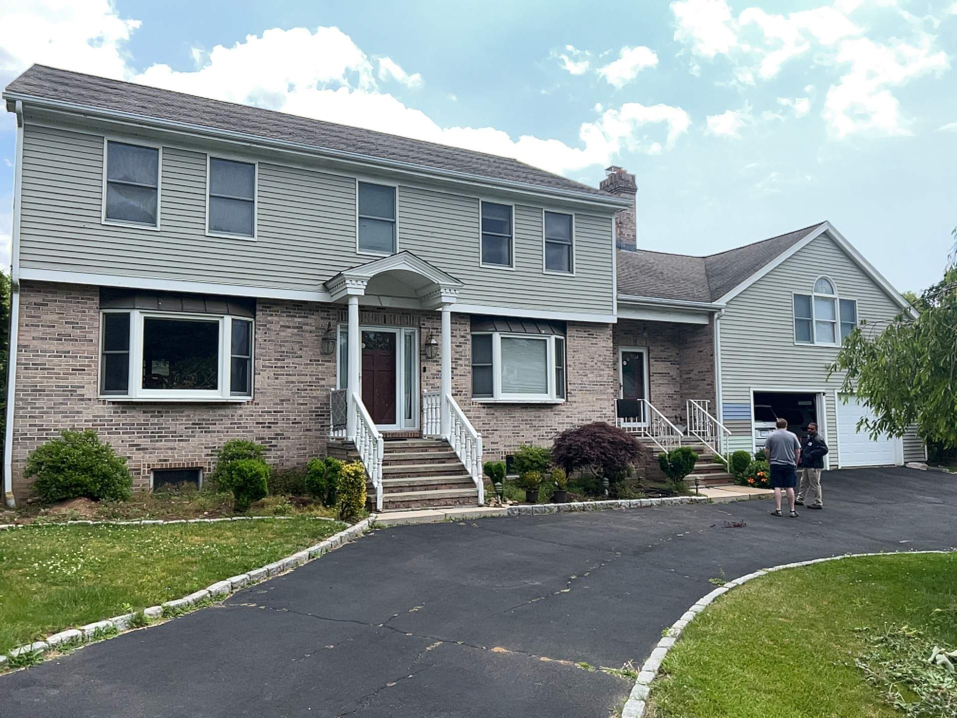 Siding Installation using Mainstreet Colonial & White gutters by A Plus Exterior
