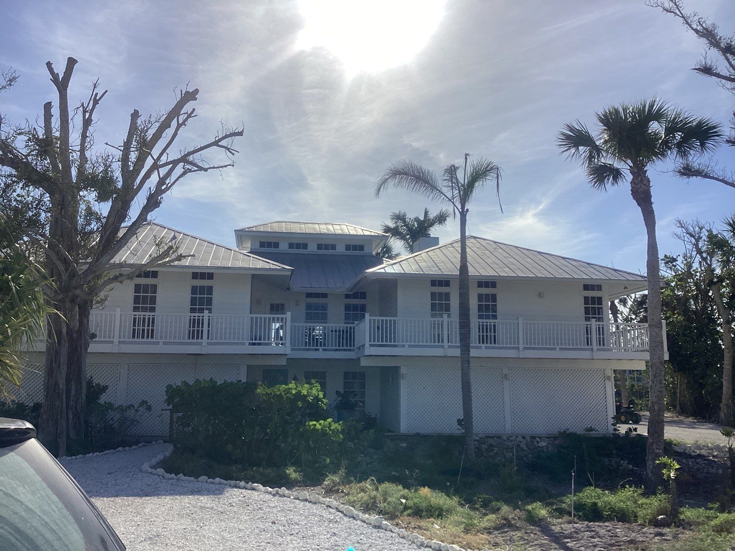 White Gutter Installation in Sanibel FL by Gutter Professors