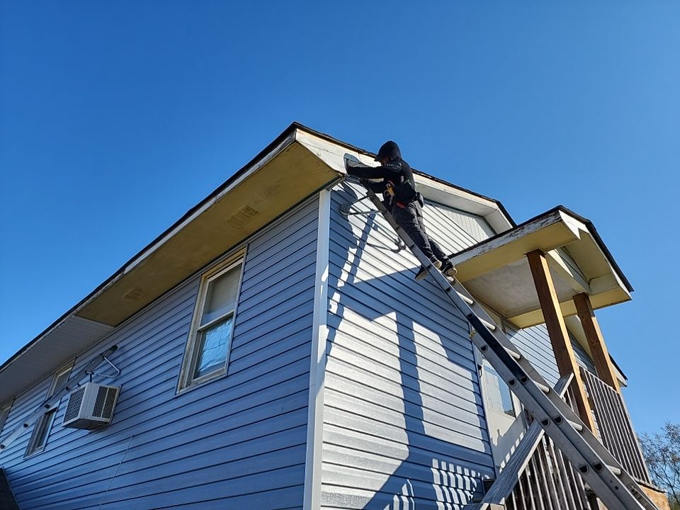 Interior and exterior renovation using Royal Building Products by Indigo State Roofing