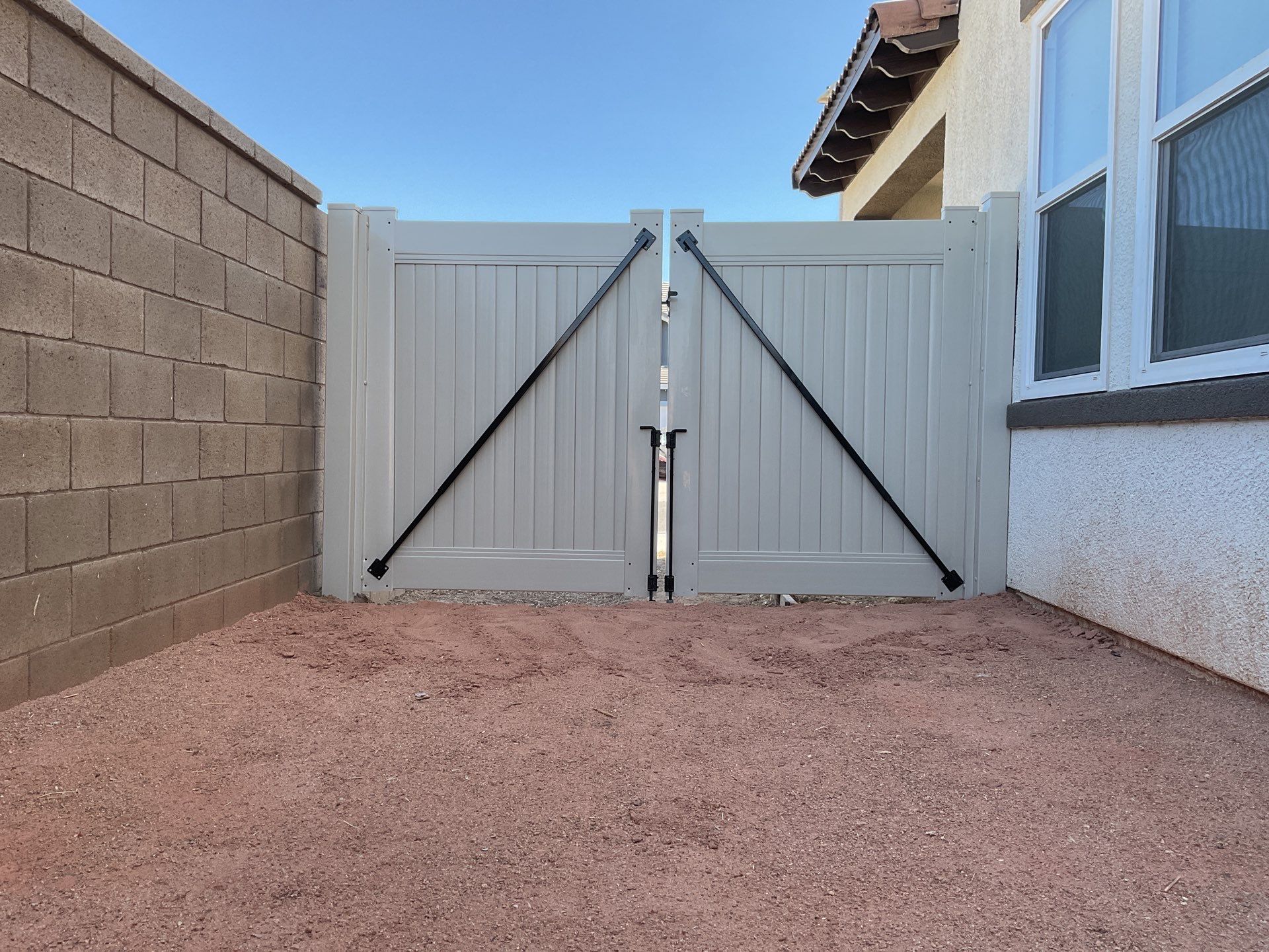 Gate installation using Vinyl by Fence Guys Inc.