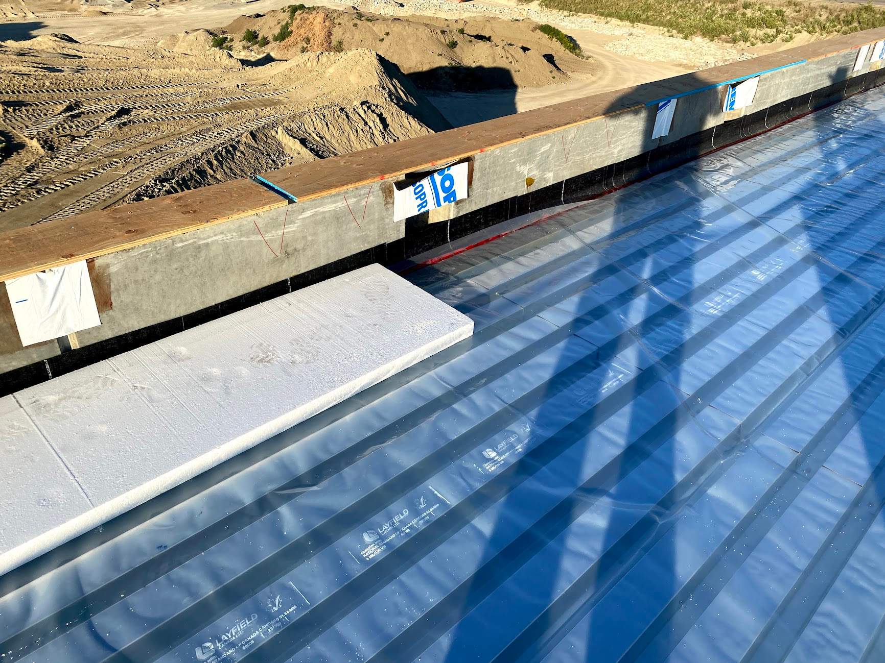 Commercial Roofing Installation using Durolast by Top Notch Roofing Inc