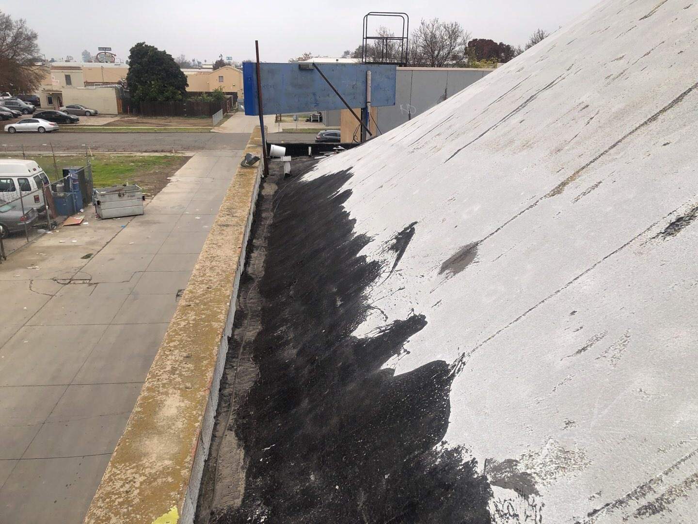 Spray foam and coatings using Conklin Benchmark/PUMA XL coatings and spray foam by Straight Edge Roofing Inc