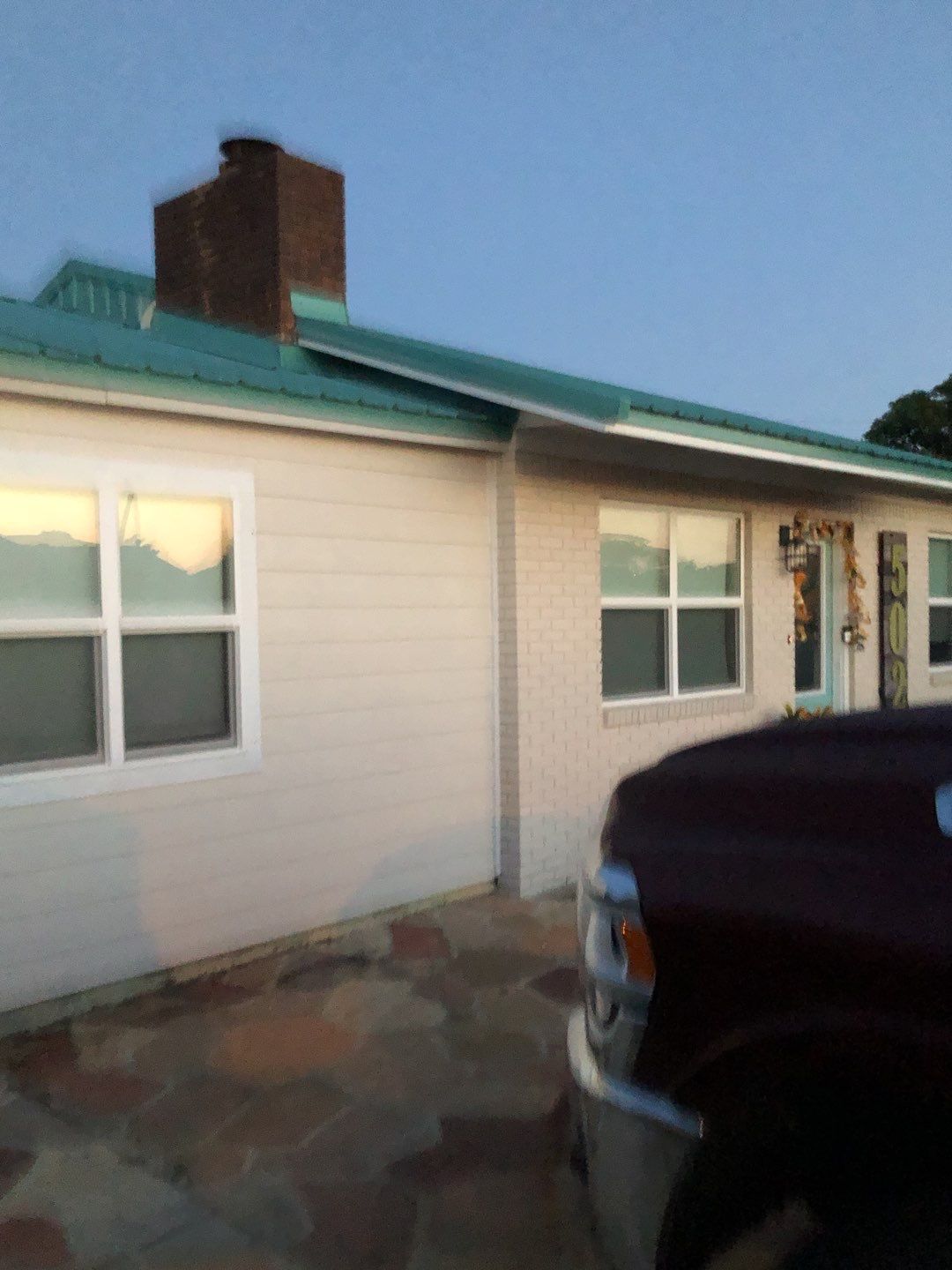 Gutter Installation using K-Style White Seamless Gutters by Gutter Professors