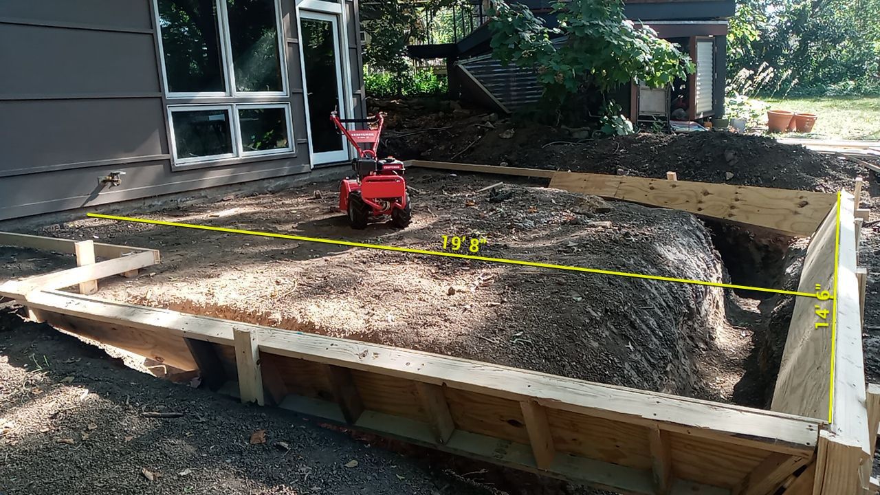 Back Yard Cantilivered Patio by LAND ESCAPES LLC