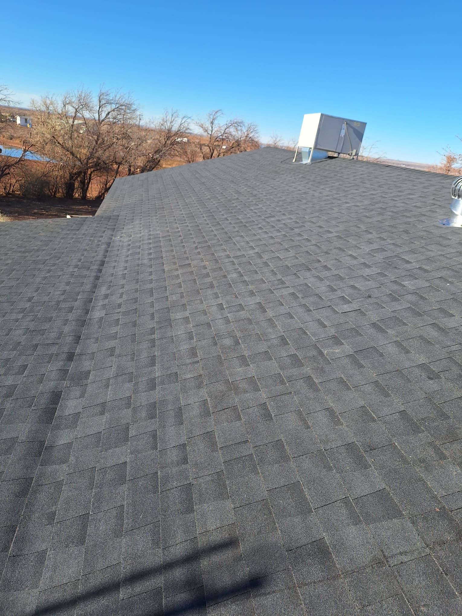 Estate Gray Shingles by Reimagine Roofing