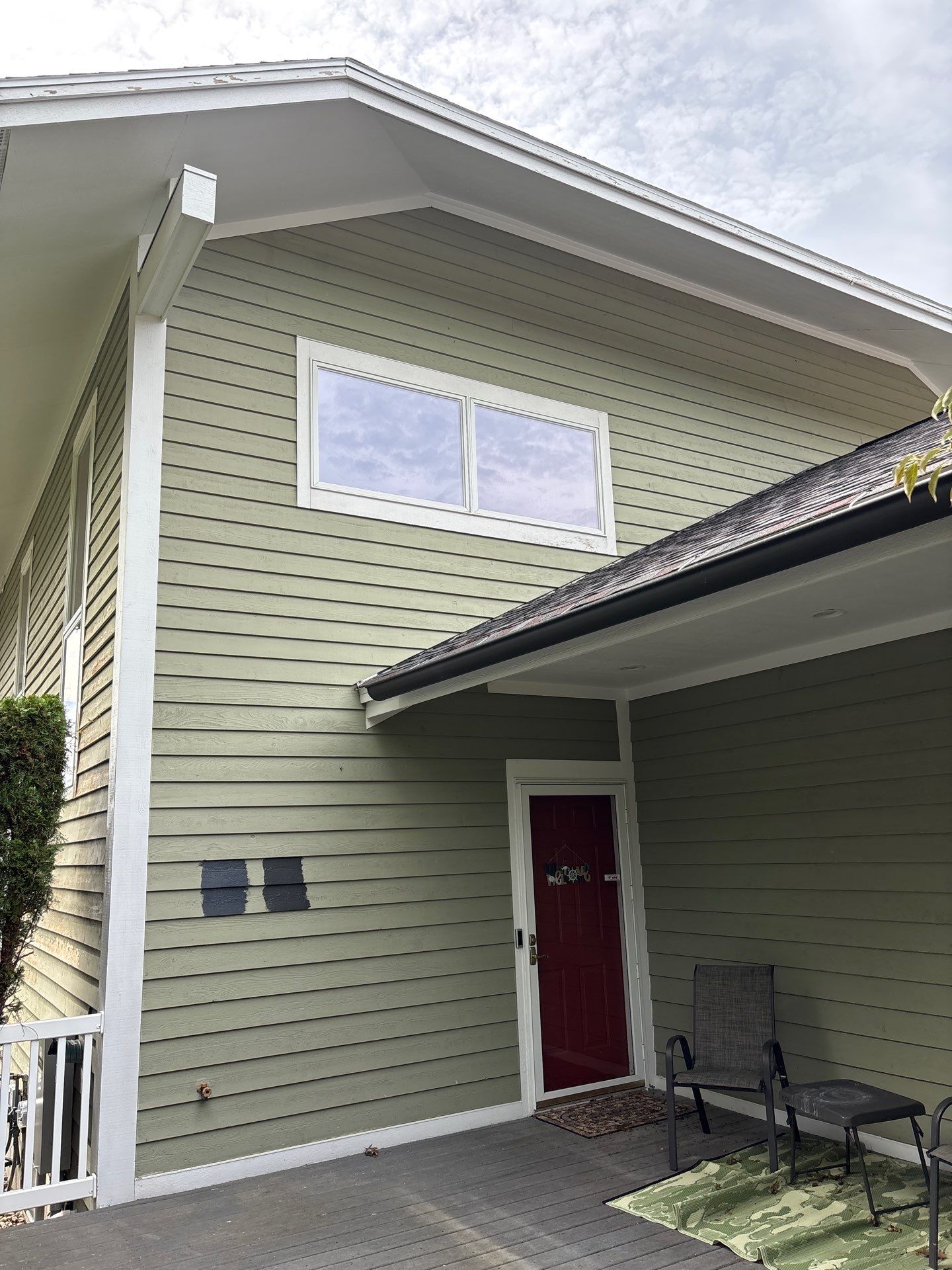 Full Exterior Painting and Trim Restoration for Muskegon Residence by Gordon Painting