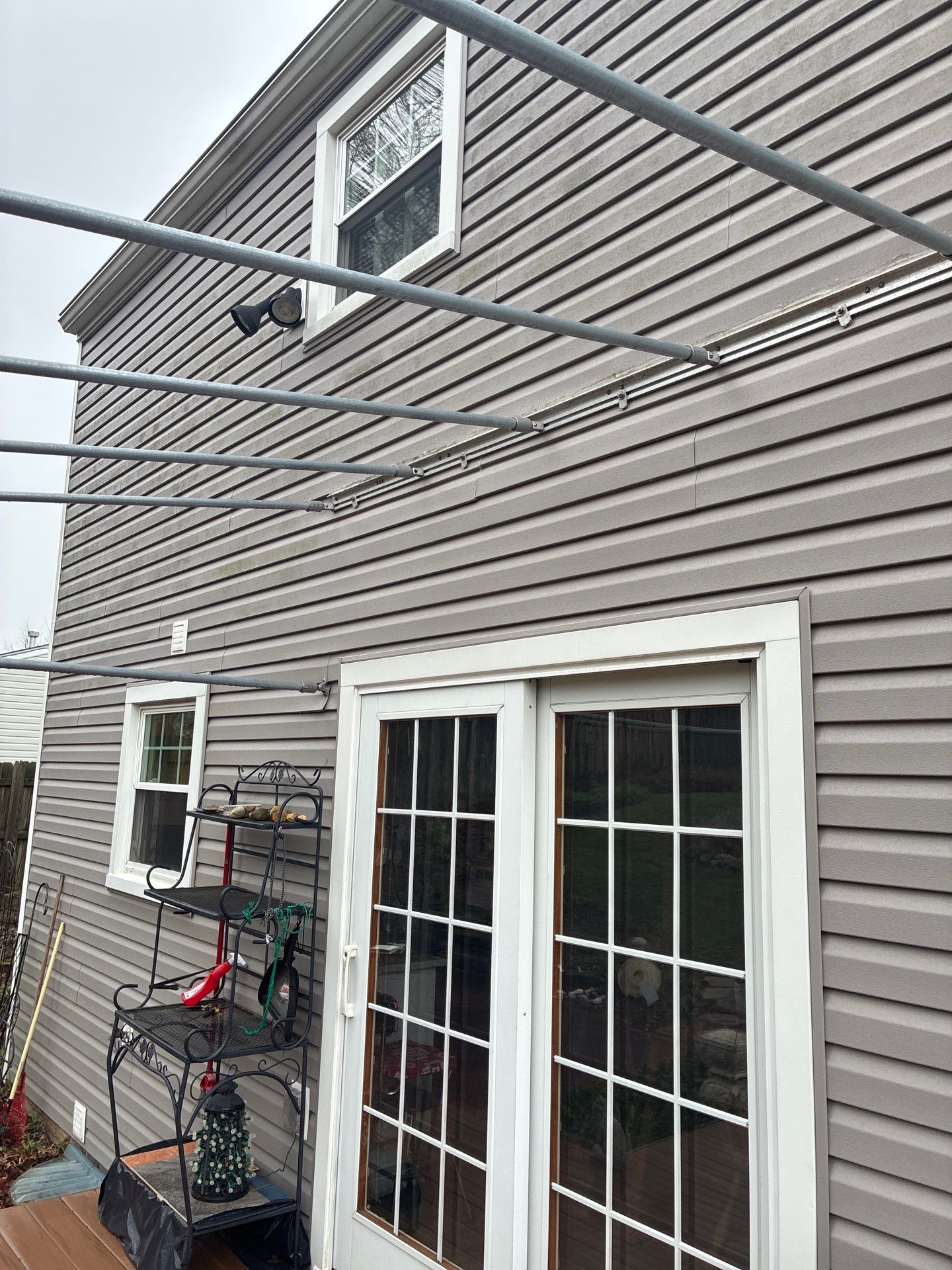 Composite Deck Build with Integrated Patio Cover in Washington by Cousins Roofing Siding & Decks