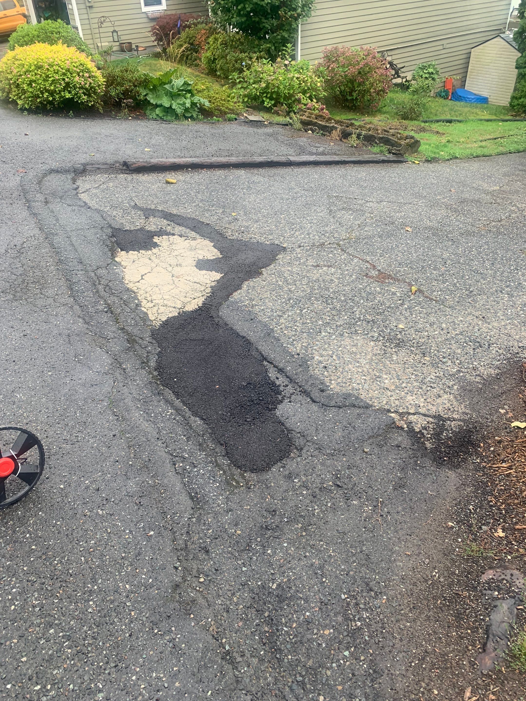 Raphil Haswega Concrete Driveway  by Jireh Asphalt & Concrete Inc 