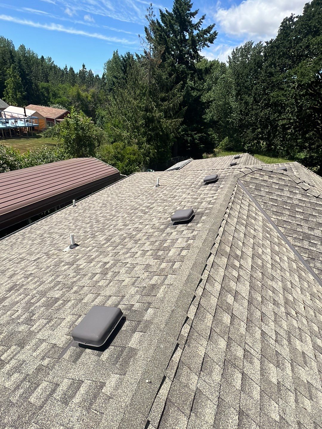 Residential Roofing Installation using IKO Dynasty (Color: Biscayne) by Orezona Building & Roofing Company, Inc.