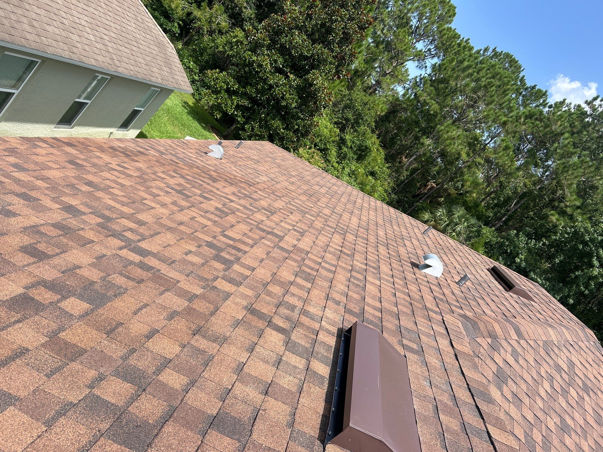 Complete Residential Roof Replacement in Port Orange Featuring Burnt Hickory Shingles by Pinnacle Roofing Group