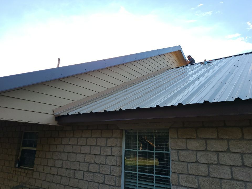 Residential Roofing Installation using PBR Metal Roof by Harvey Roofing & Construction