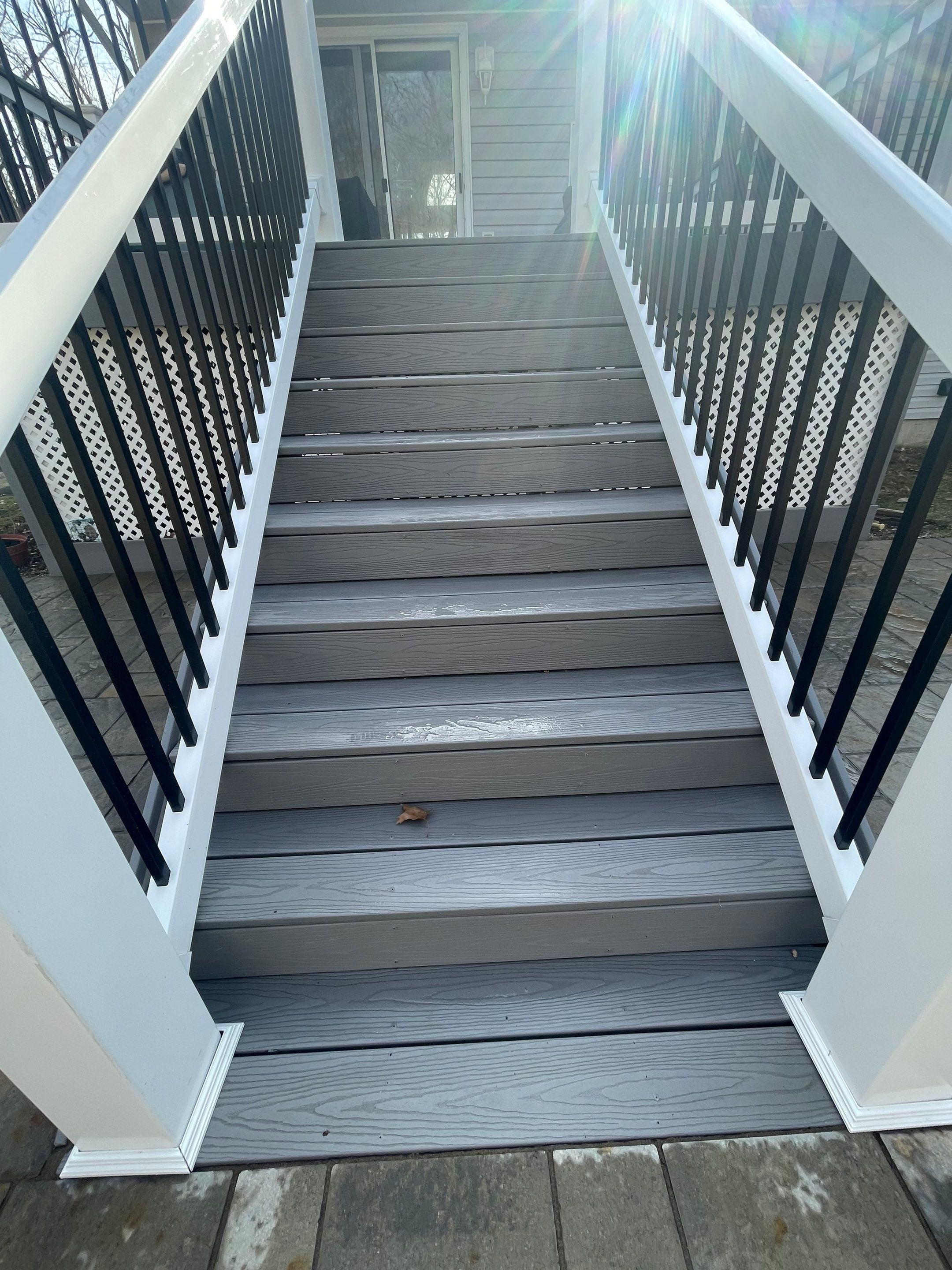 Pressure treated wood deck cleaned by SJ Exterior