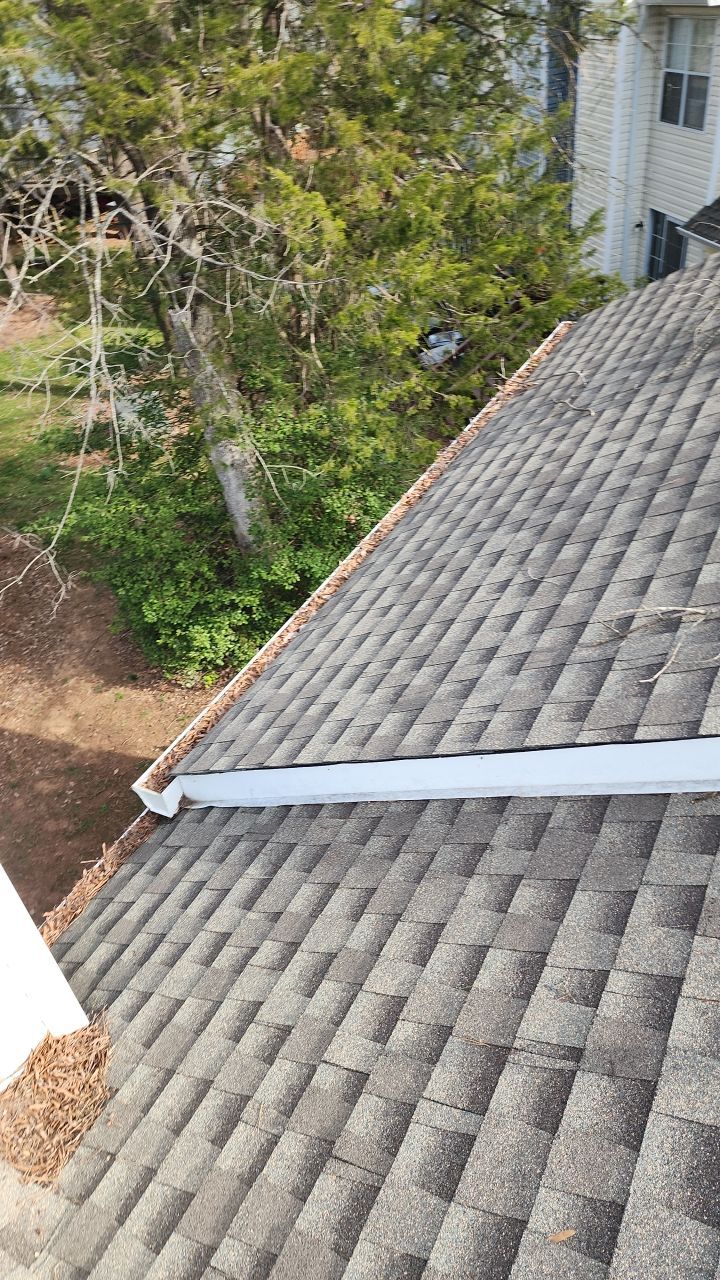 Gutter Cleaning using water by Power Wash Masters LLC