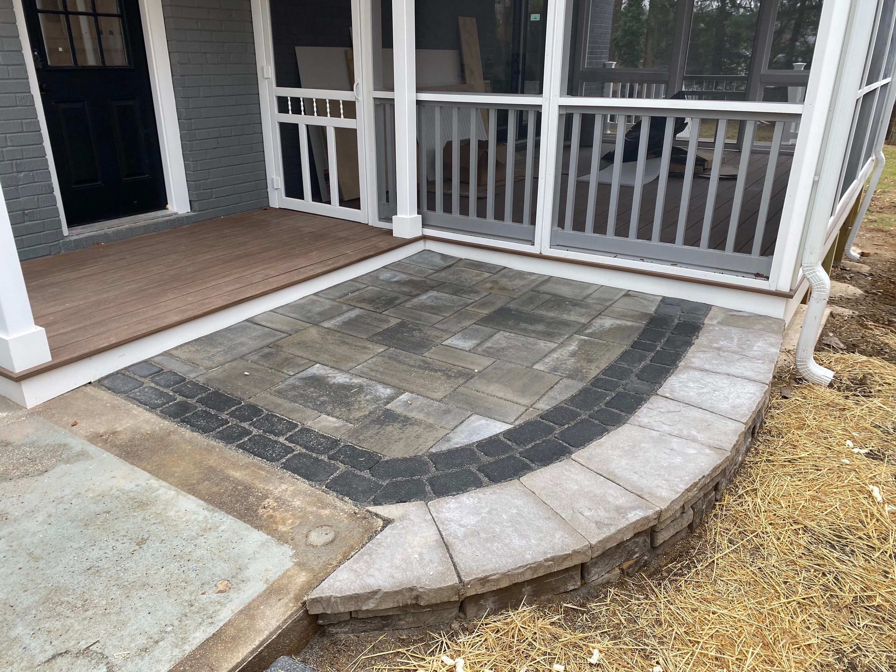 Retaining wall, walkway, small patio and landscape install by The Smet Companies, LLC