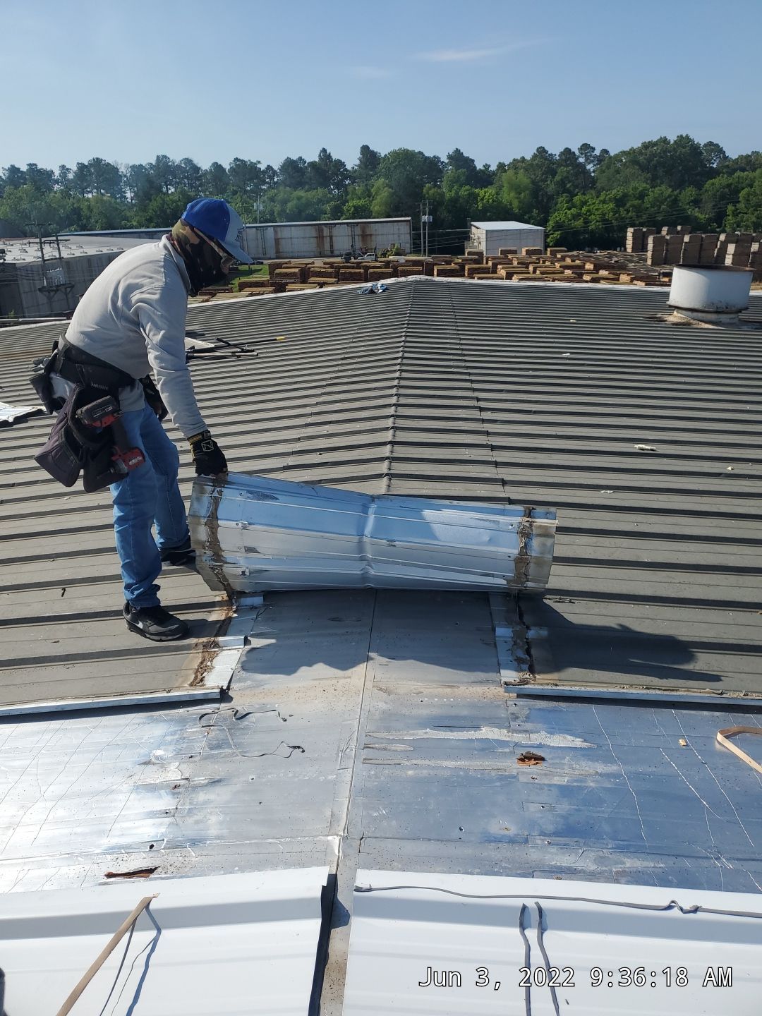 Commercial Roofing Installation using Aluminum Roofing panels by Hostetler Roofing