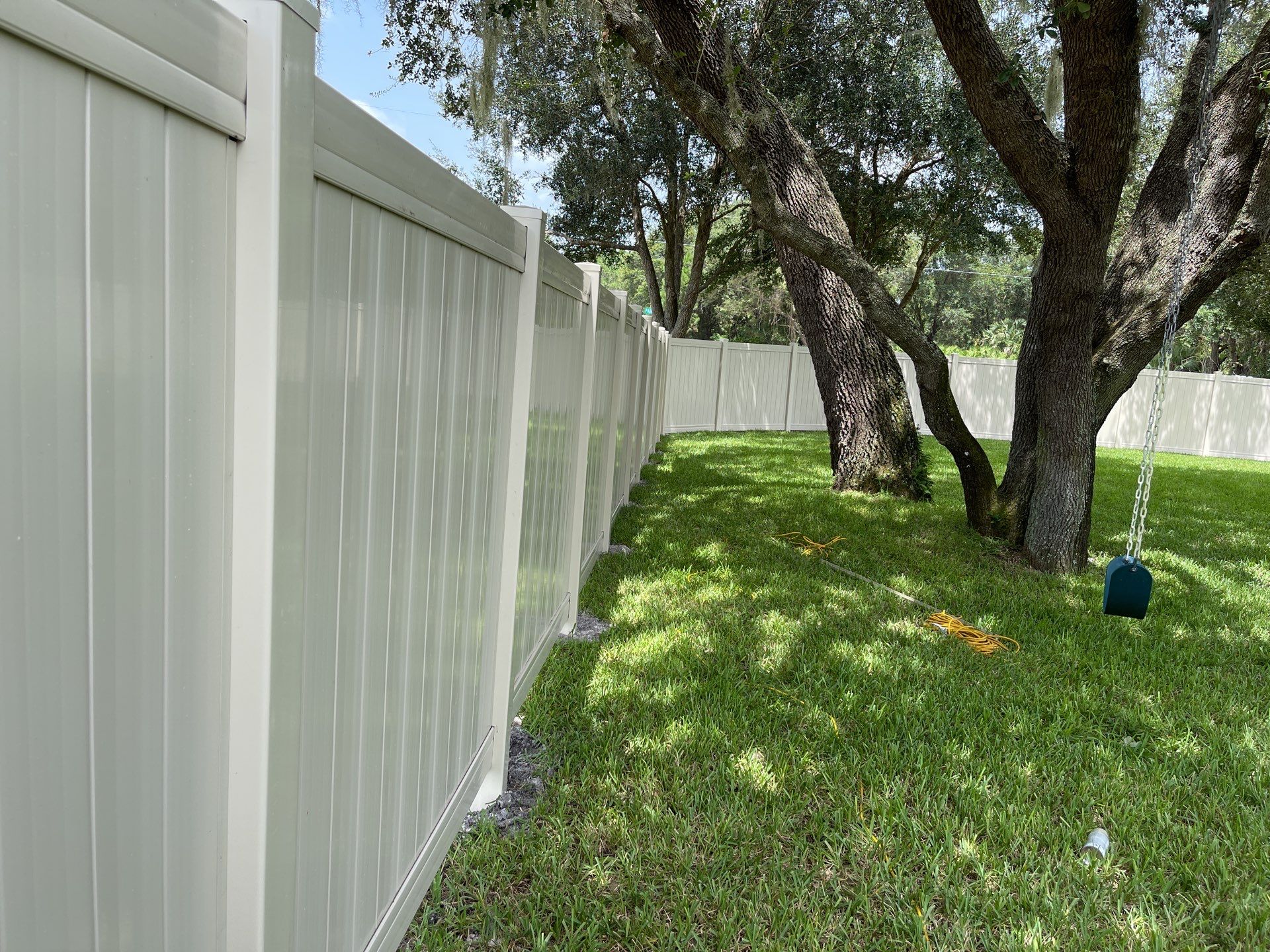North Port, FL Tan Vinyl Privacy Fence  by Asap fence and gates, LLC