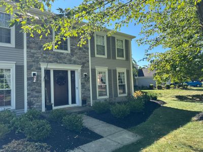 Vinyl Siding w. Stone Facade