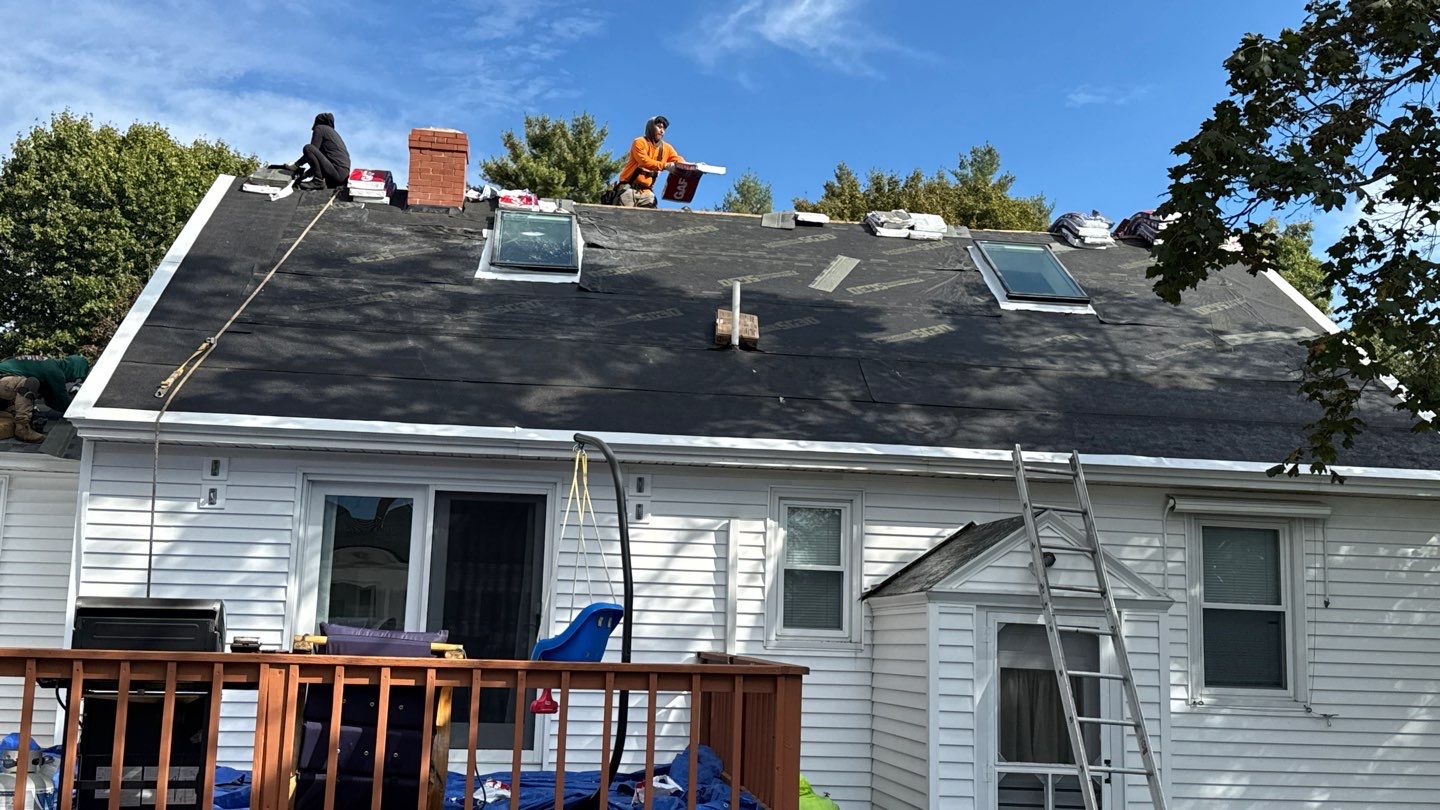 Complete Roof Replacement with GAF Pewter Gray HDZ™ Shingles, VELUX Skylights & New Gutters by Sensible Home Solutions