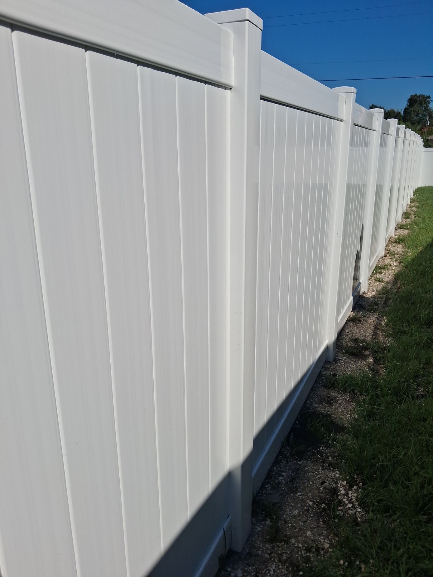White Vinyl Privacy Fence Installation for North Port Residence by True Fence LLC