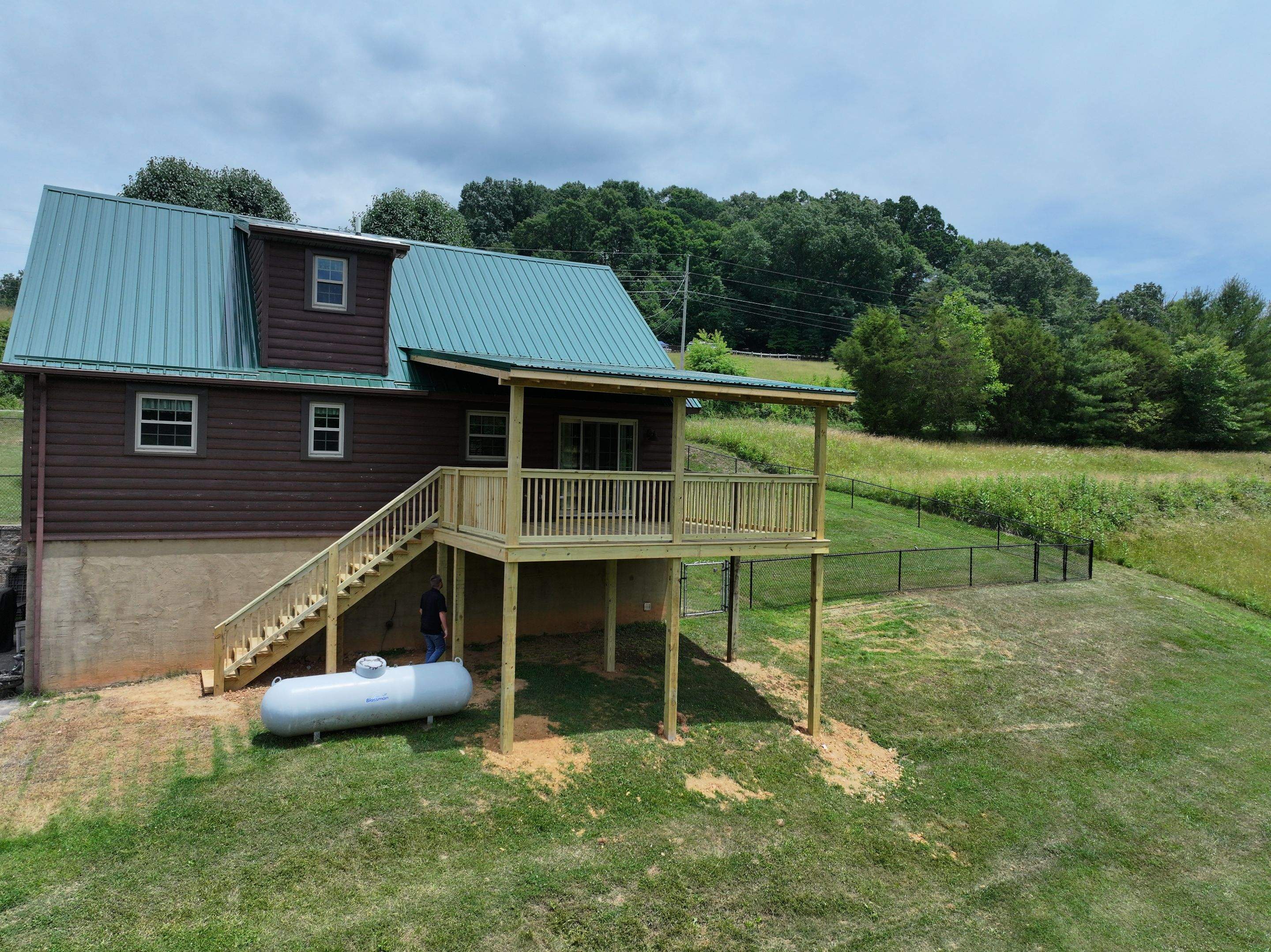 Paddle Creek Pet Ranch Cabin  by Omnia Roofing