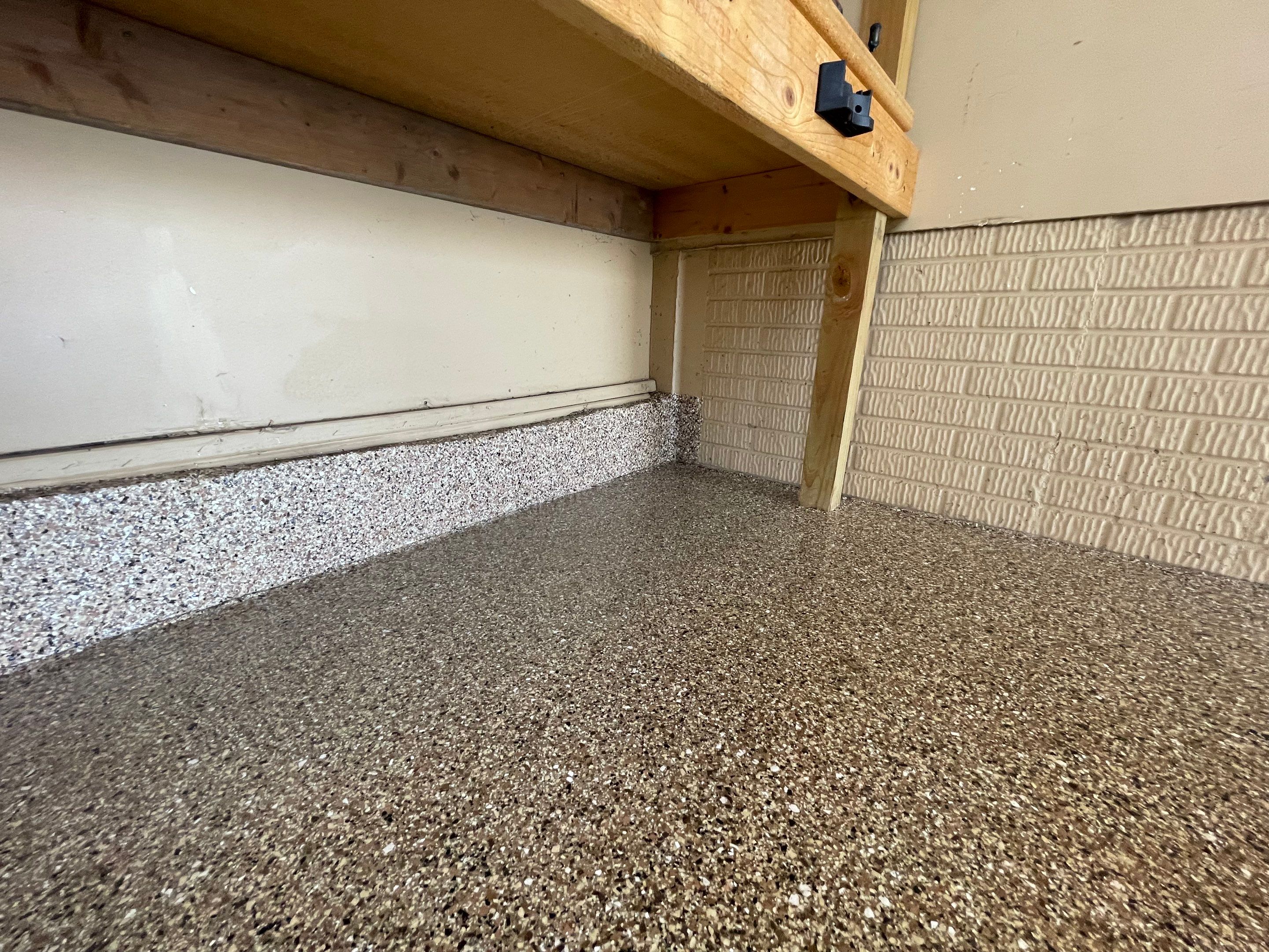 Residential Garage Floor Transformation with Speckled Epoxy Coating by Select Painting, Coatings & Garage Cabinets