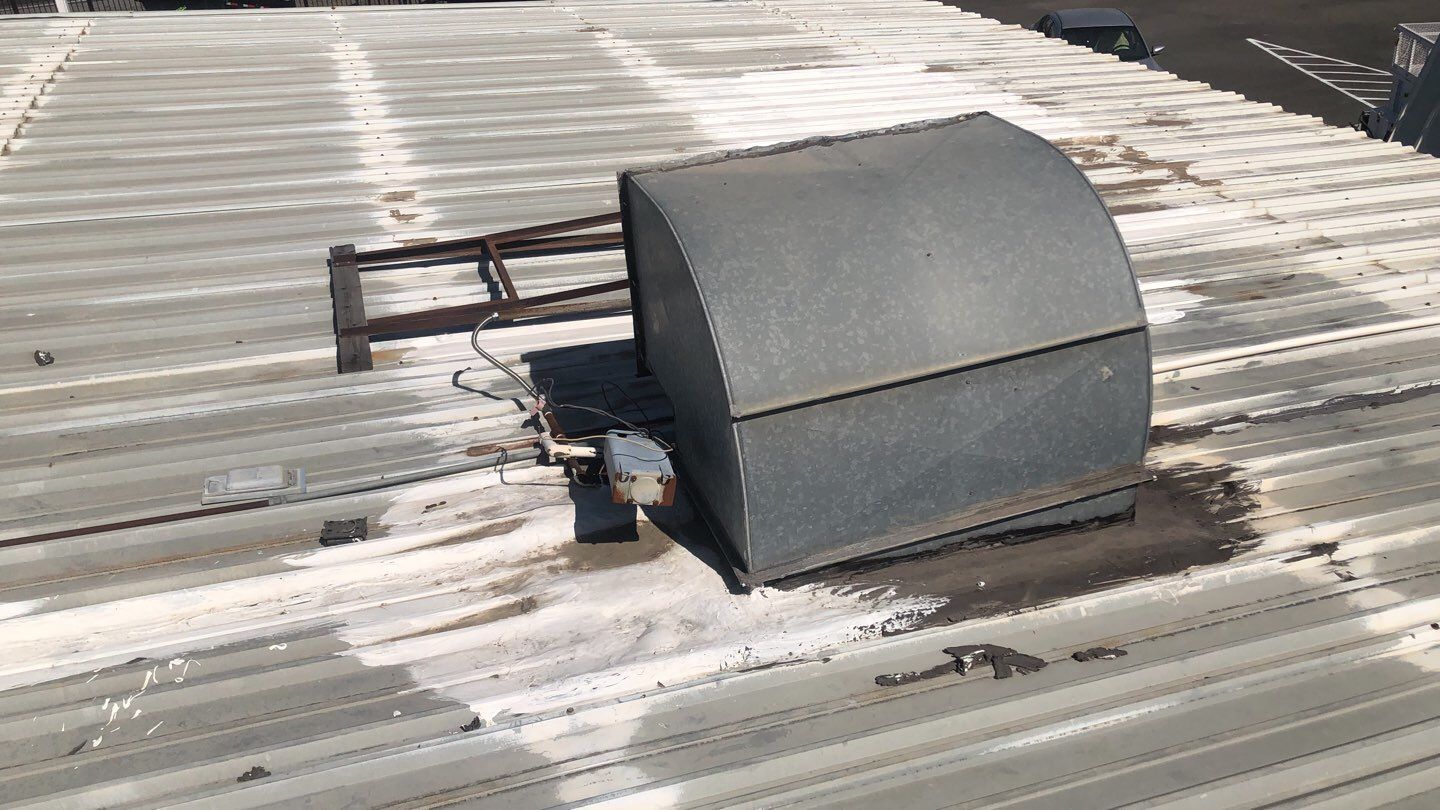 Metal Restoration Roofing system with Benchmark/PUMA XL 20 yr warranty by Straight Edge Roofing Inc