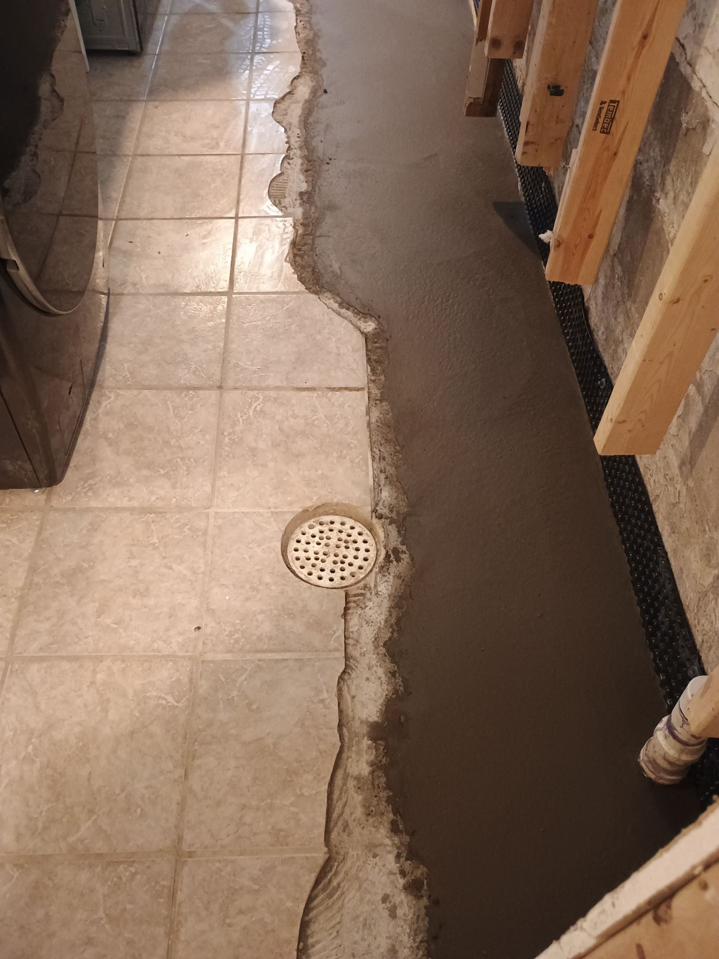 Drain Tile in Minneapolis for Kristen & Taylor by Waterproofing Northeast
