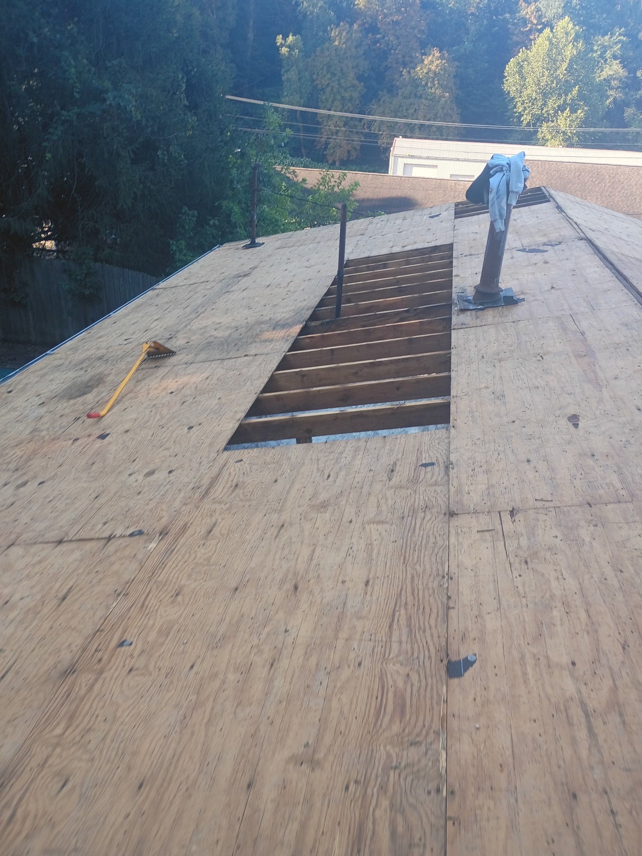 Residential Roofing Installation using GAF TImberline HDZ Hickory by Rainstoppers Roofing