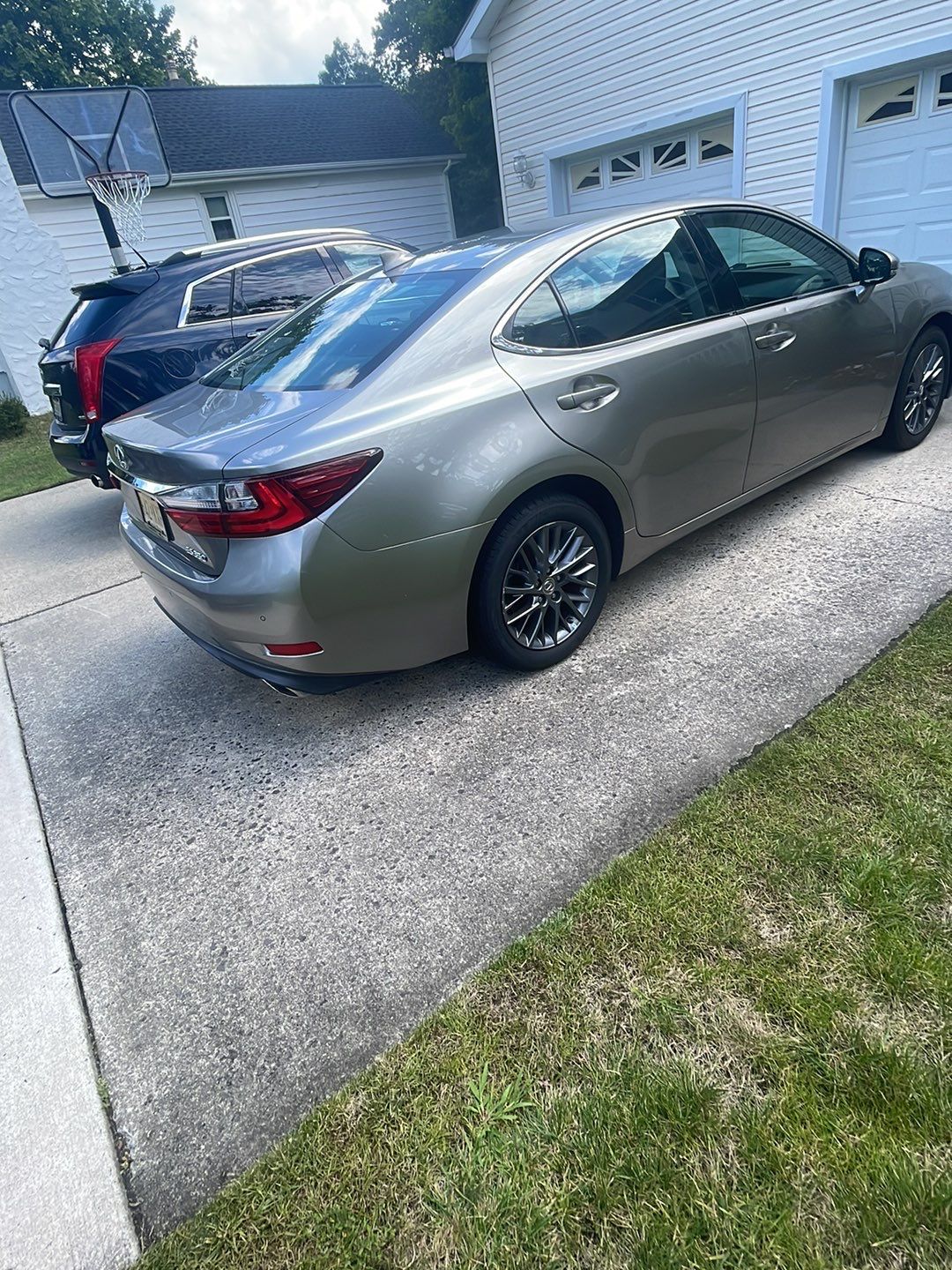 House Wash, Roof Refresh sections & Concrete Cleaning by SJ Exterior