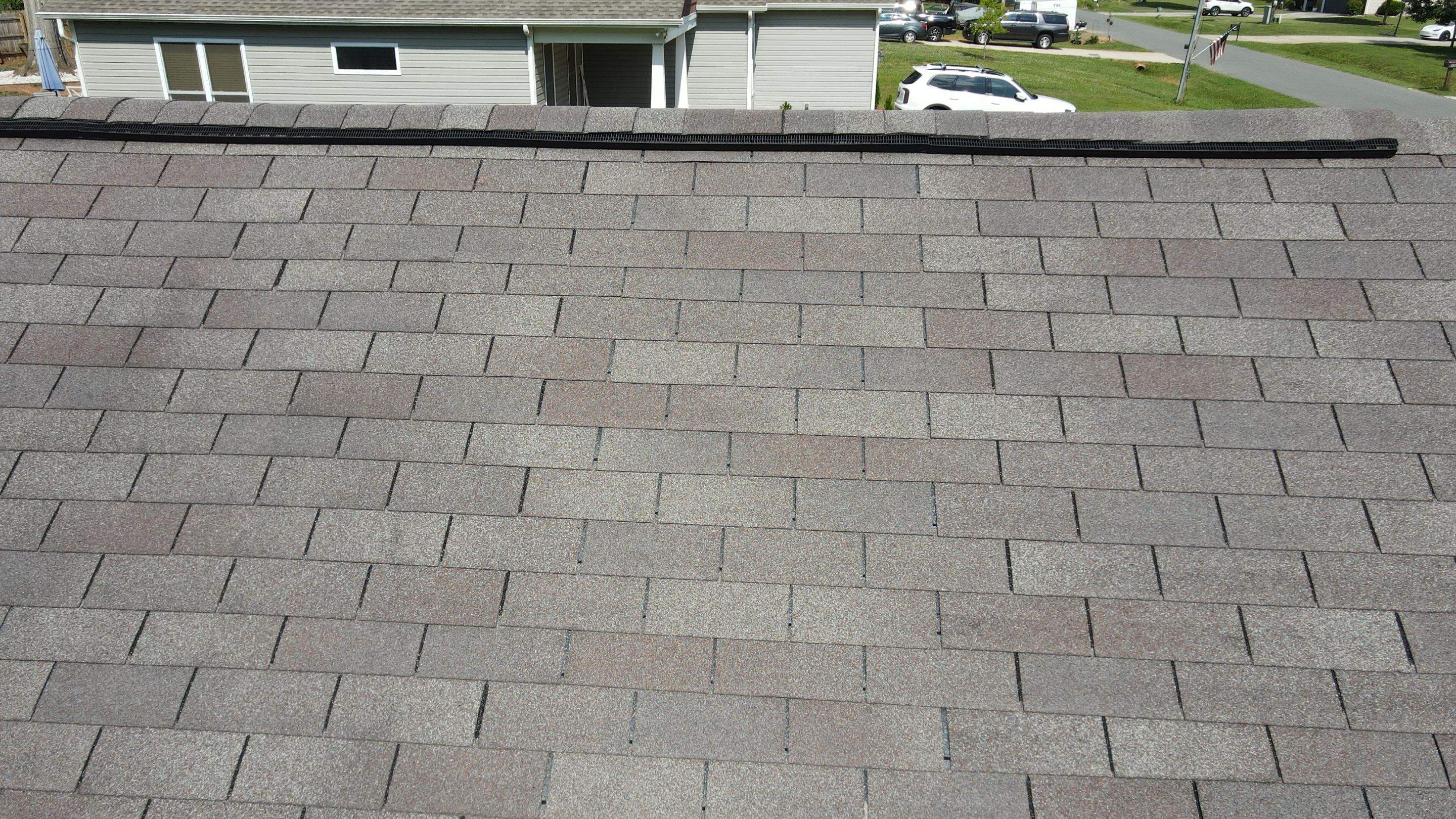 Residential Roofing Installation using Owens Corning Oakridge Onyx Black by RISE Roofing & Restoration, LLC