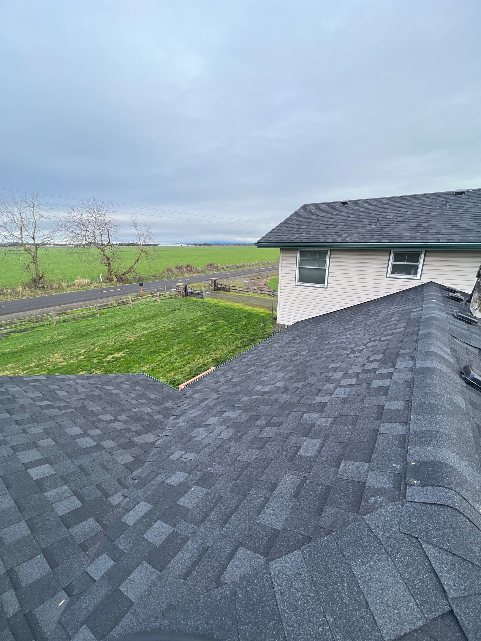 Residential Roofing Installation using IKO Dynasty (Color: Granite Black) by Orezona Building & Roofing Company, Inc.
