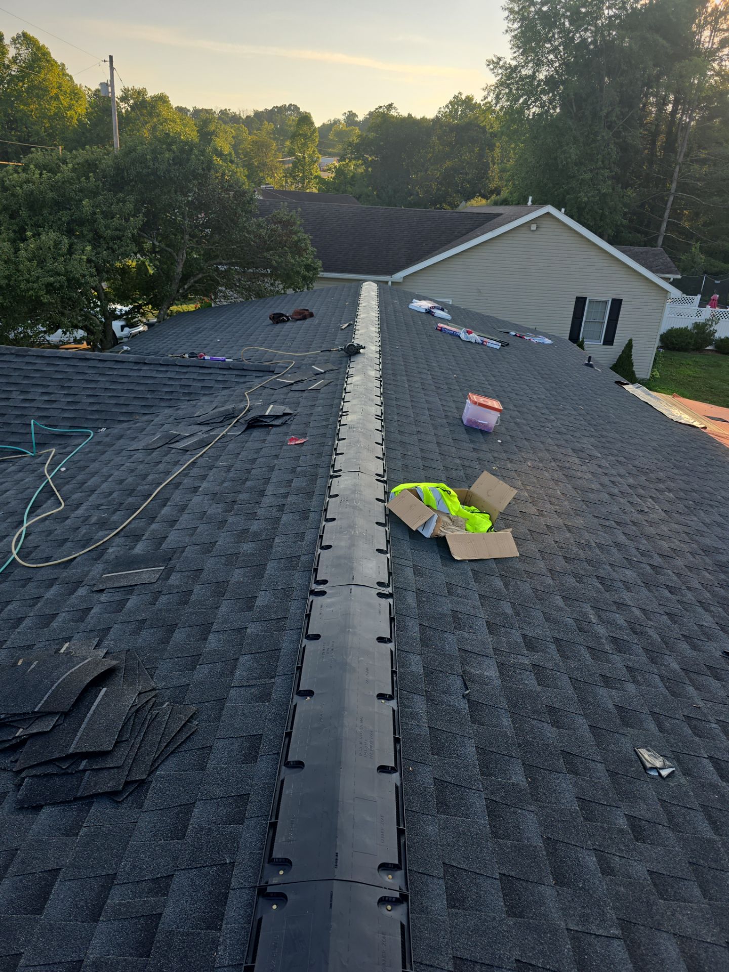 Residential Roofing Installation using GAF Timberline HDZ Charcoal by Rainstoppers Roofing