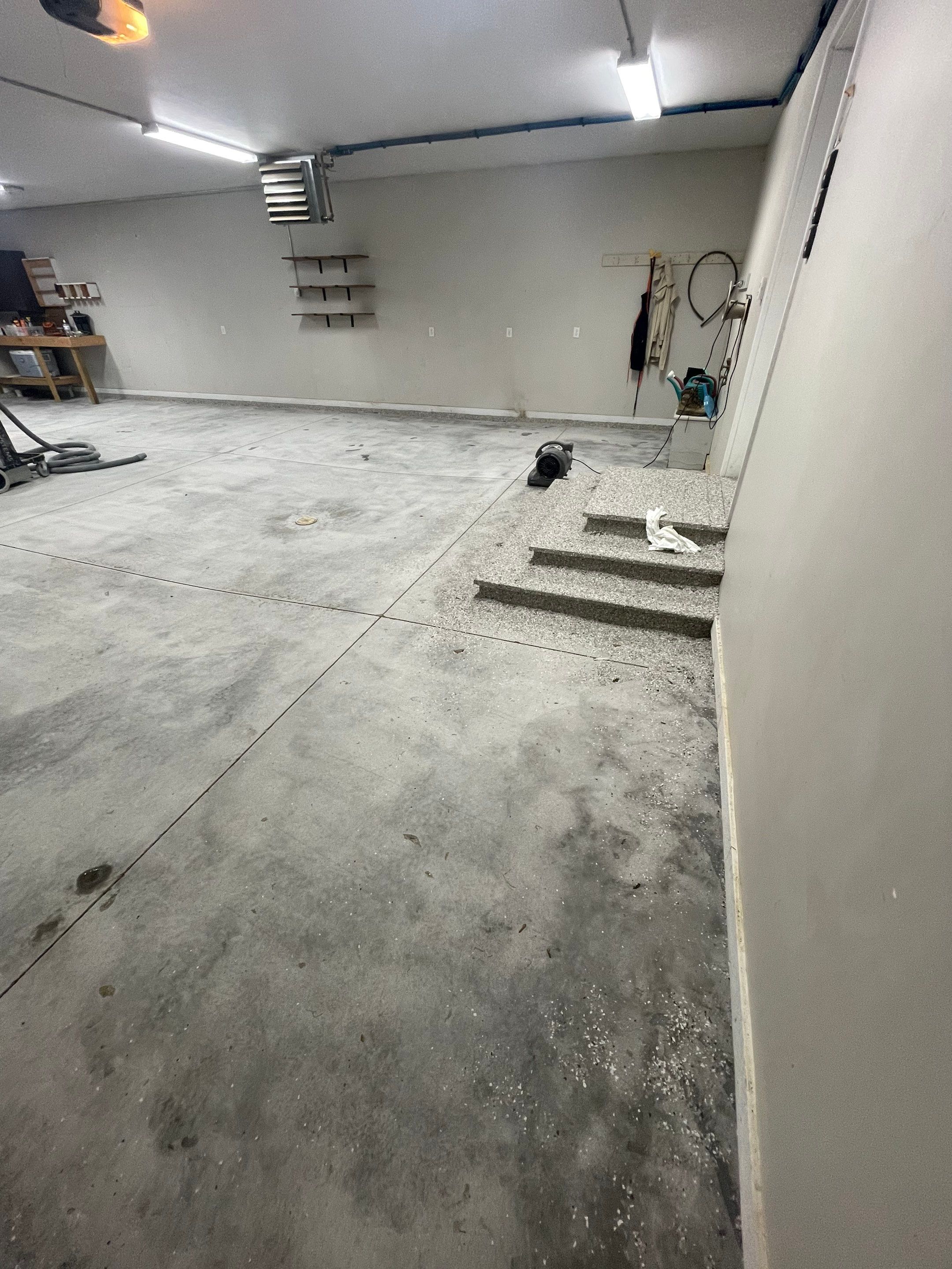 Grey Speckled Polyuera Garage Floor Coating for Hartford Three-Car Garage by Select Painting, Coatings & Garage Cabinets
