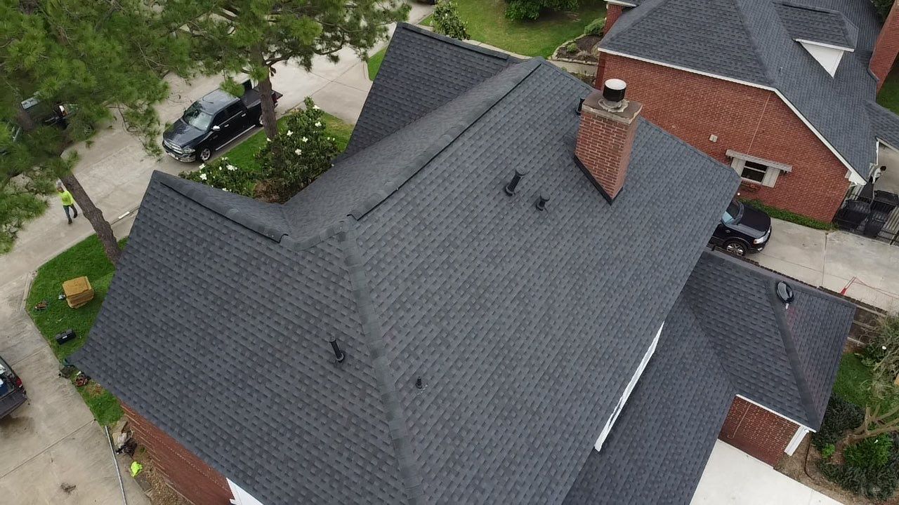 Complete GAF HDZ Charcoal Roof Installation for NW Houston Home by Houston Roofing & Construction