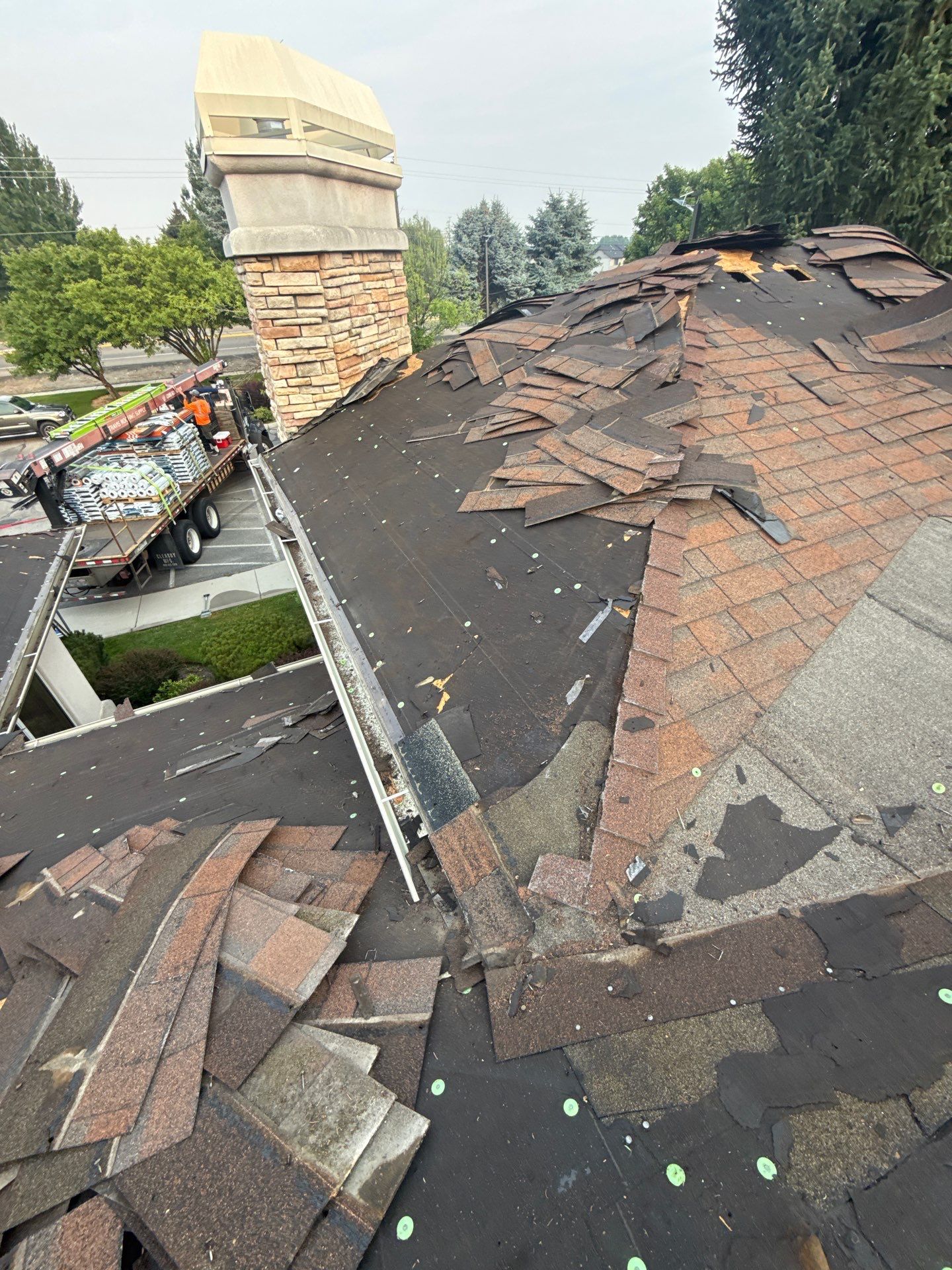 Boise Commercial Roof Replacement with Brown Architectural Shingles by Olive Roofing