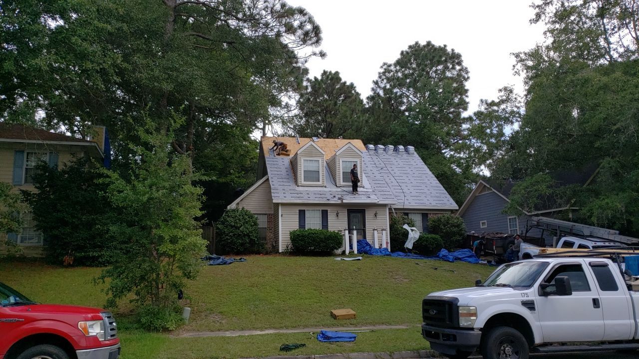 Residential Roofing Installation using Roof Replacement by American Roofing & Construction LLC