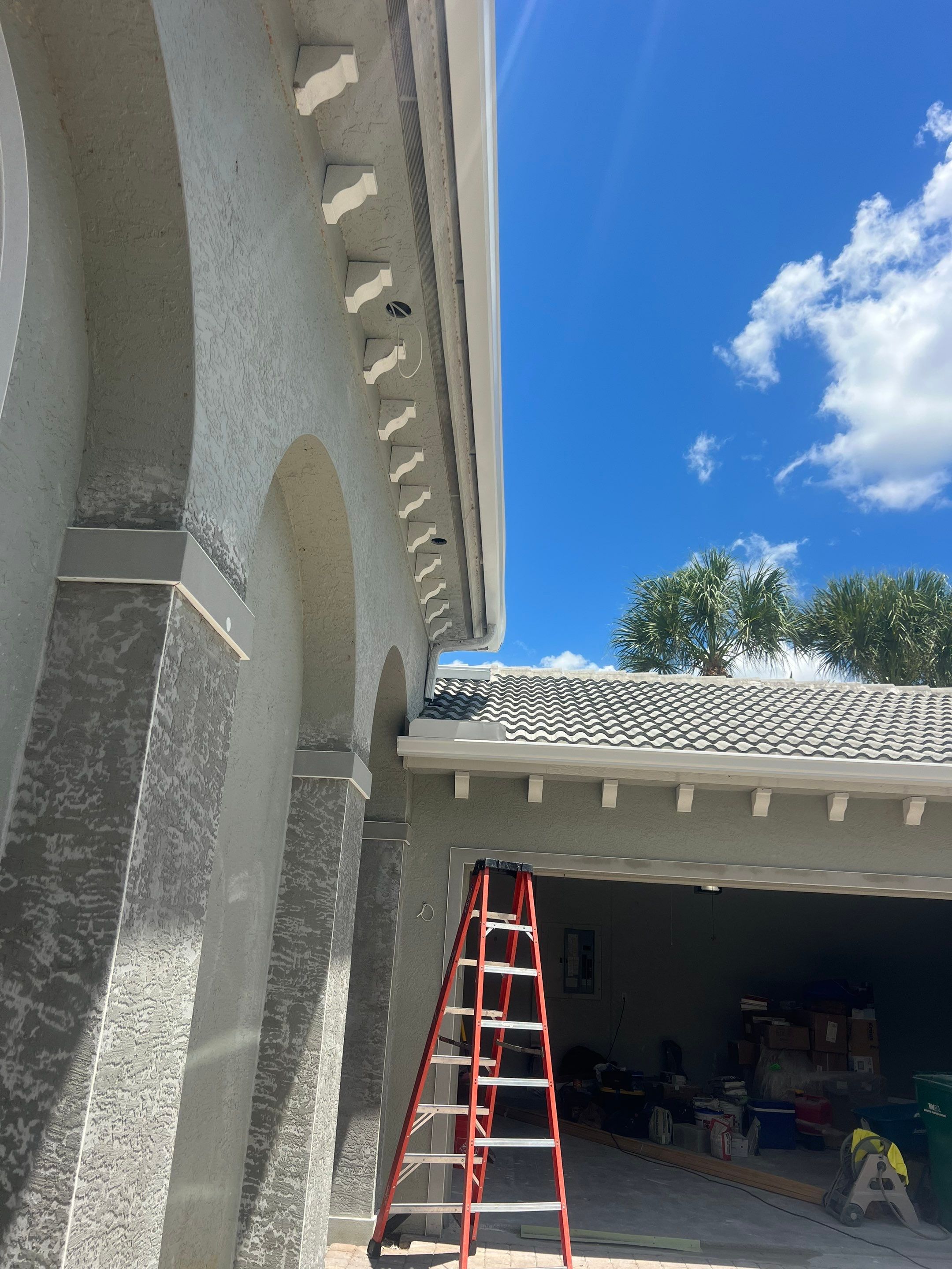 6 Inch Seamless Gutters and Downspout Installation in Naples FL by Gutter Professors