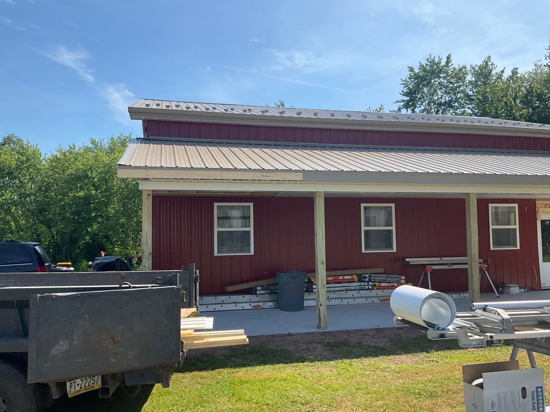Covered Concrete Porch Addition and Exterior Door Installation in Tower City by Esh Builders