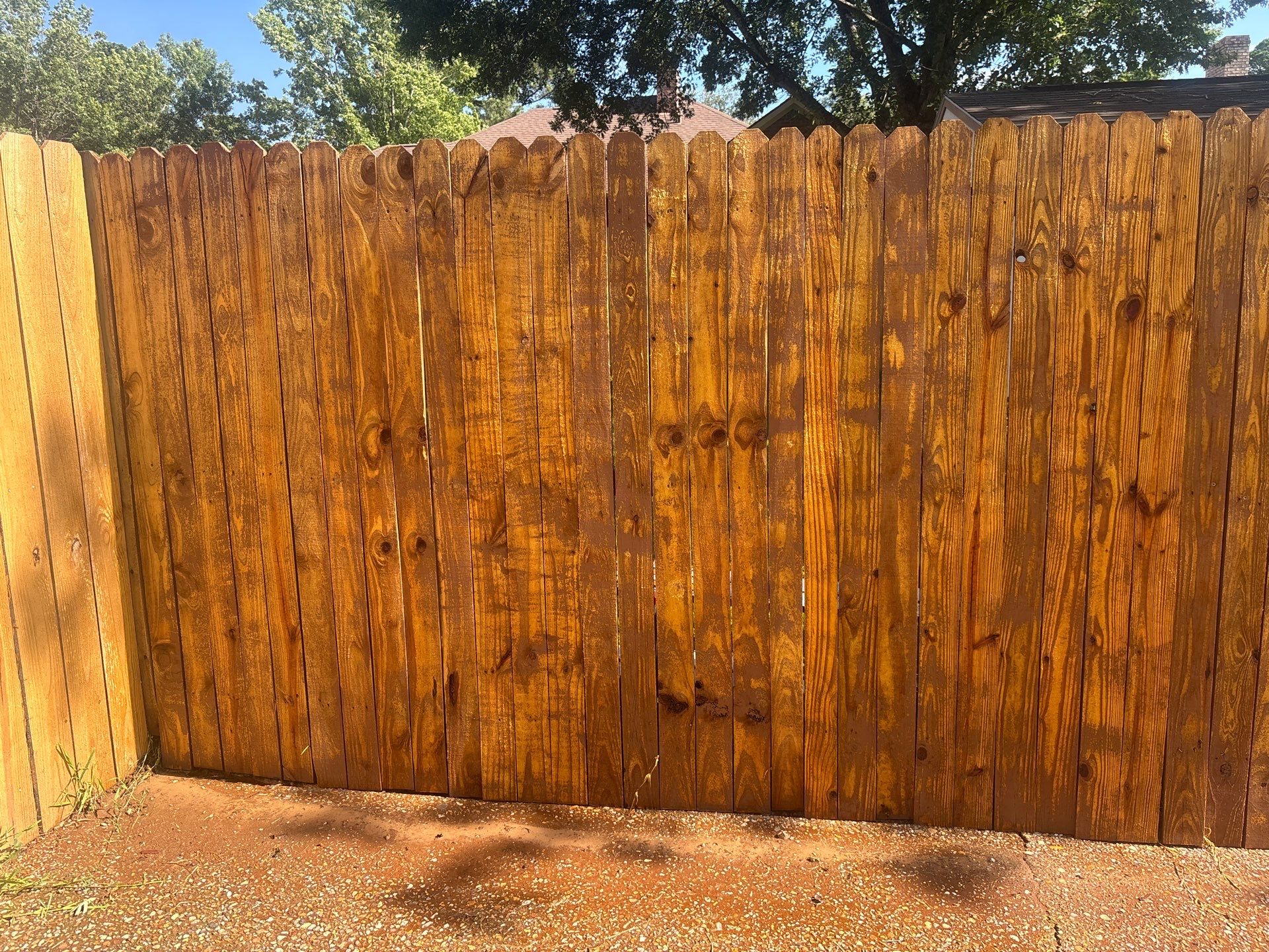 Project in TylerExterior Painting in Tyler, TX | White Brick Home, Varnished Fence & Shed Painting by Quality Coats Painting