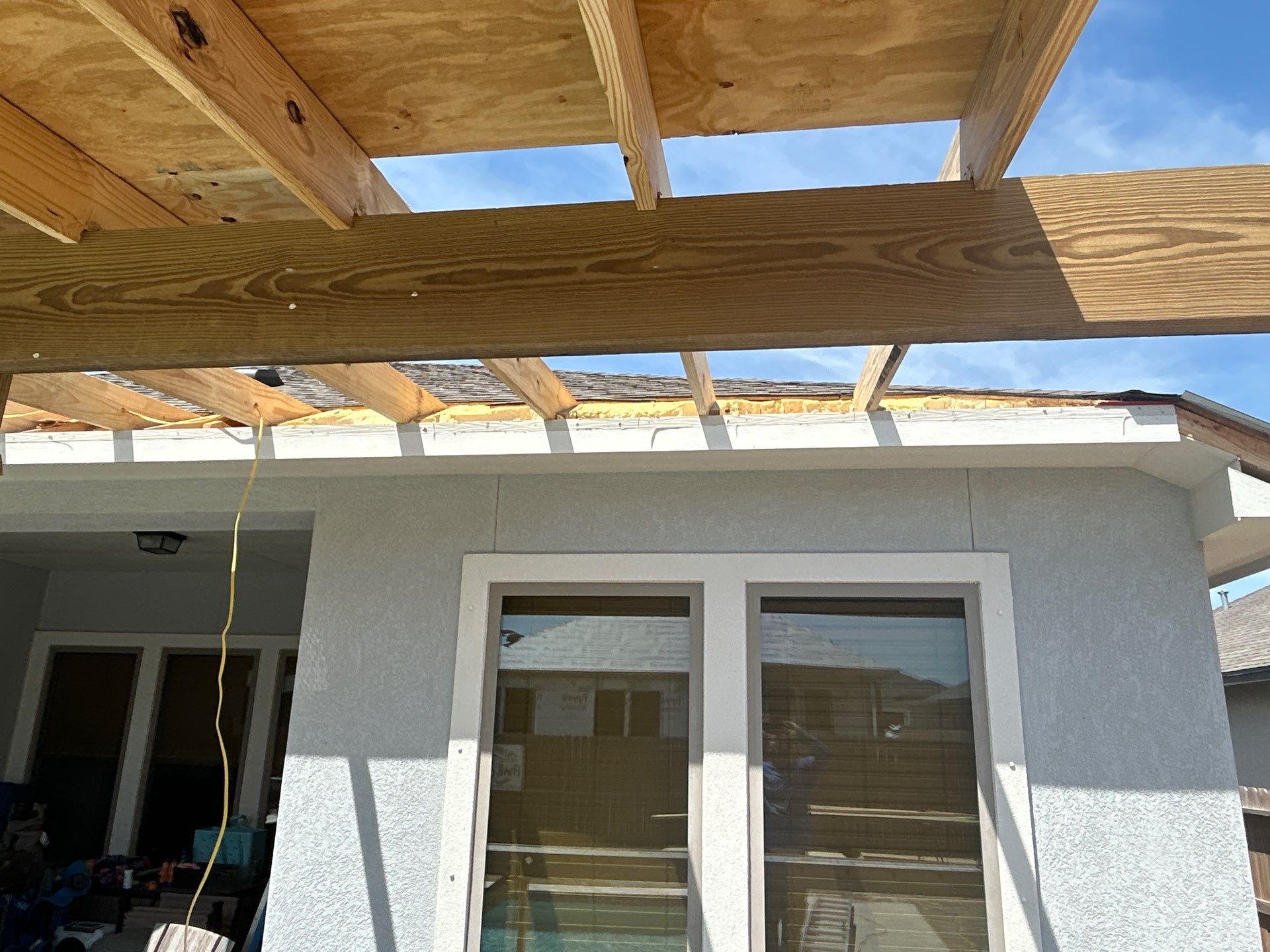 Patio Pool Cover by Bayfront Roofing and Construction