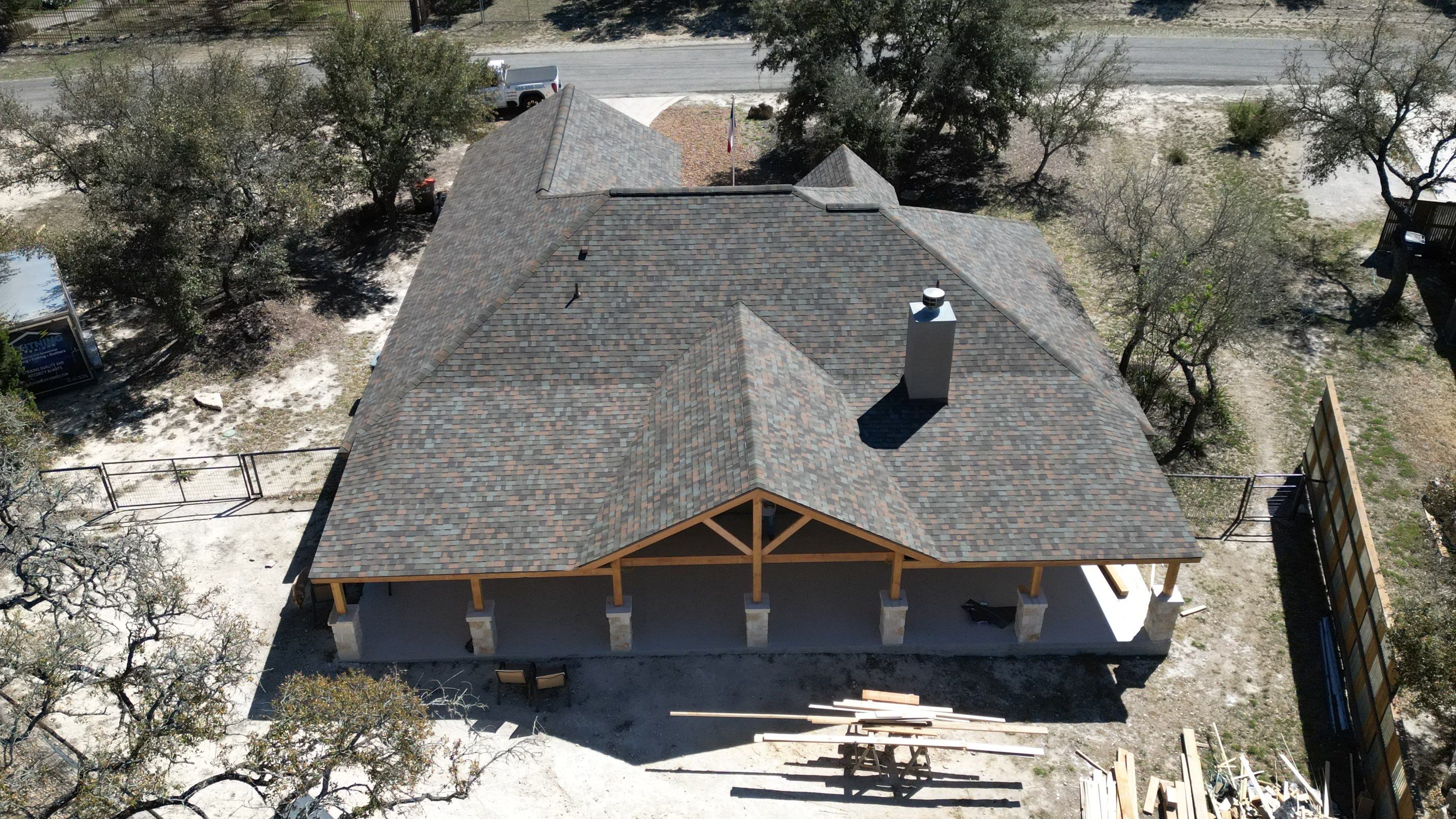 Reroof with Back Patio Addition using Owens Corning Duration Aged Copper by Lightning Exteriors