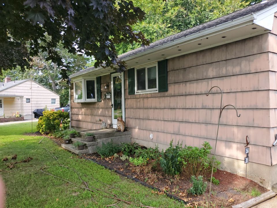 Siding Installation using Certainteed Mainstreet Forest Green by A Plus Exterior