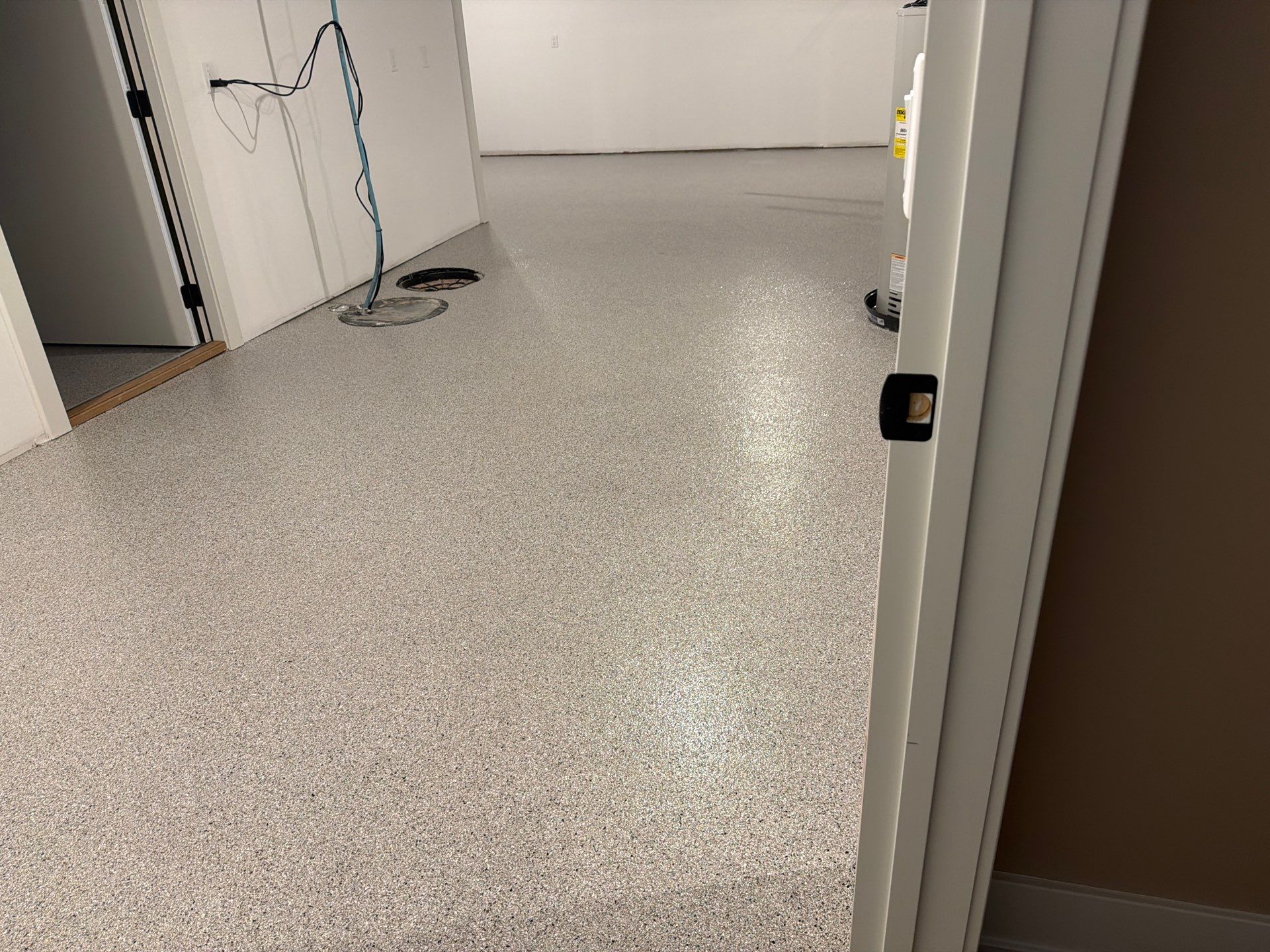 Garage & Basement Epoxy Floor Coating | Whitehall, Michigan by Gordon Painting