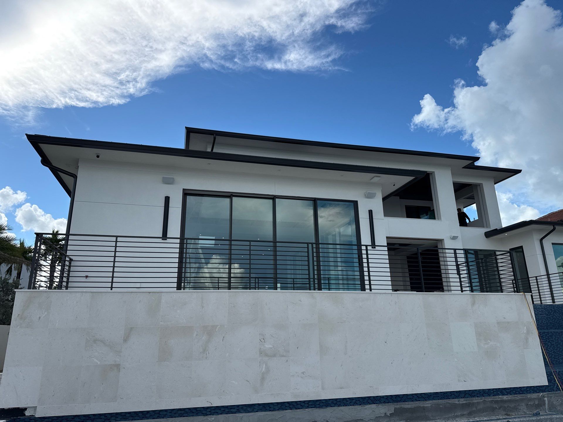 Seamless Aluminum Gutter Installation using black seamless gutters in Sarasota FL by Gutter Professors