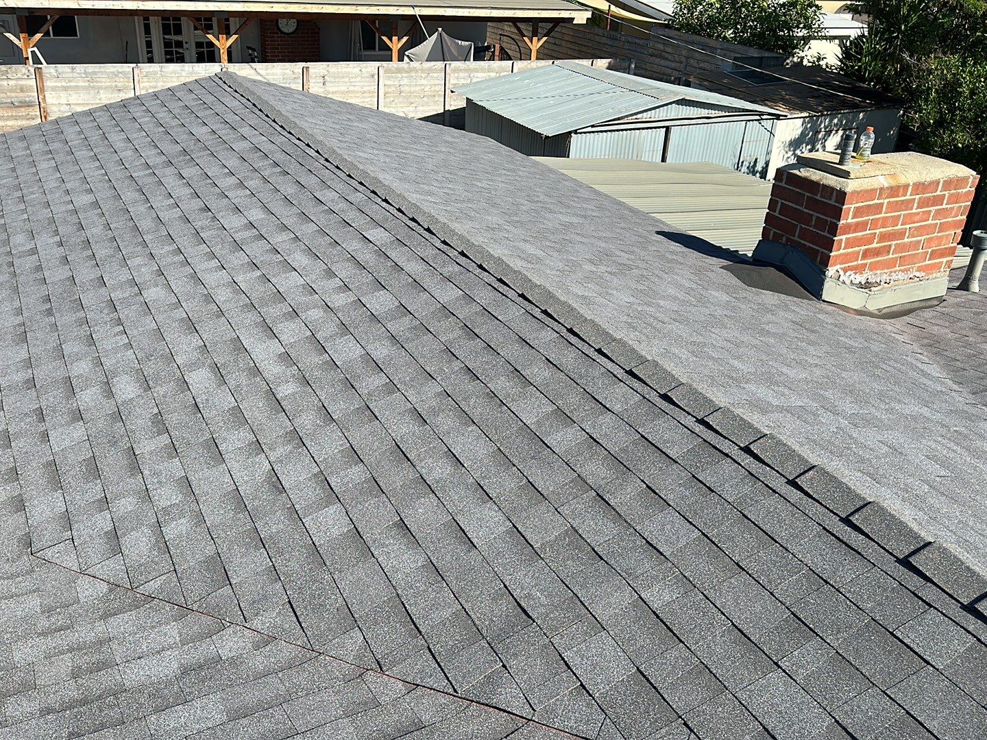 Estate Gray Shingles by Reimagine Roofing