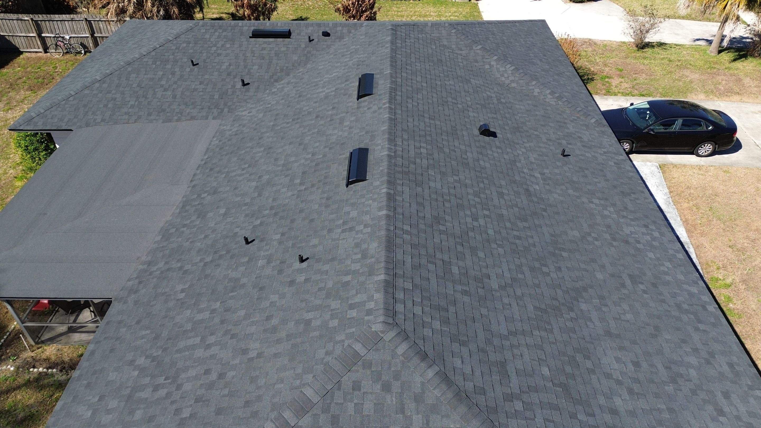Moire black roof in Conway FL by Gold Key Roofing