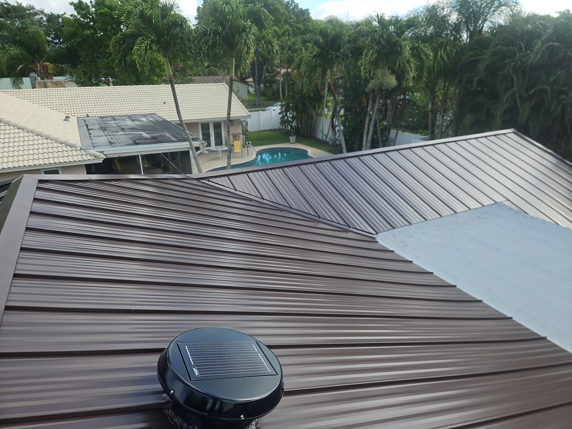 Residential Roofing Installation using 1" Nail strip metal roof by BLUES BROTHERS ROOFING